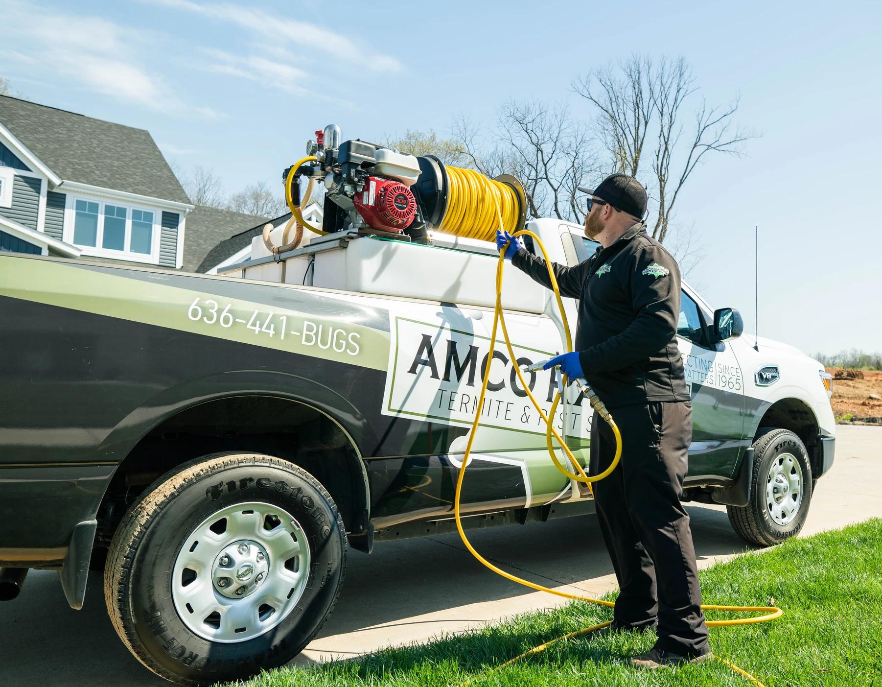 Amco ranger employee preparing his equipment before getting started