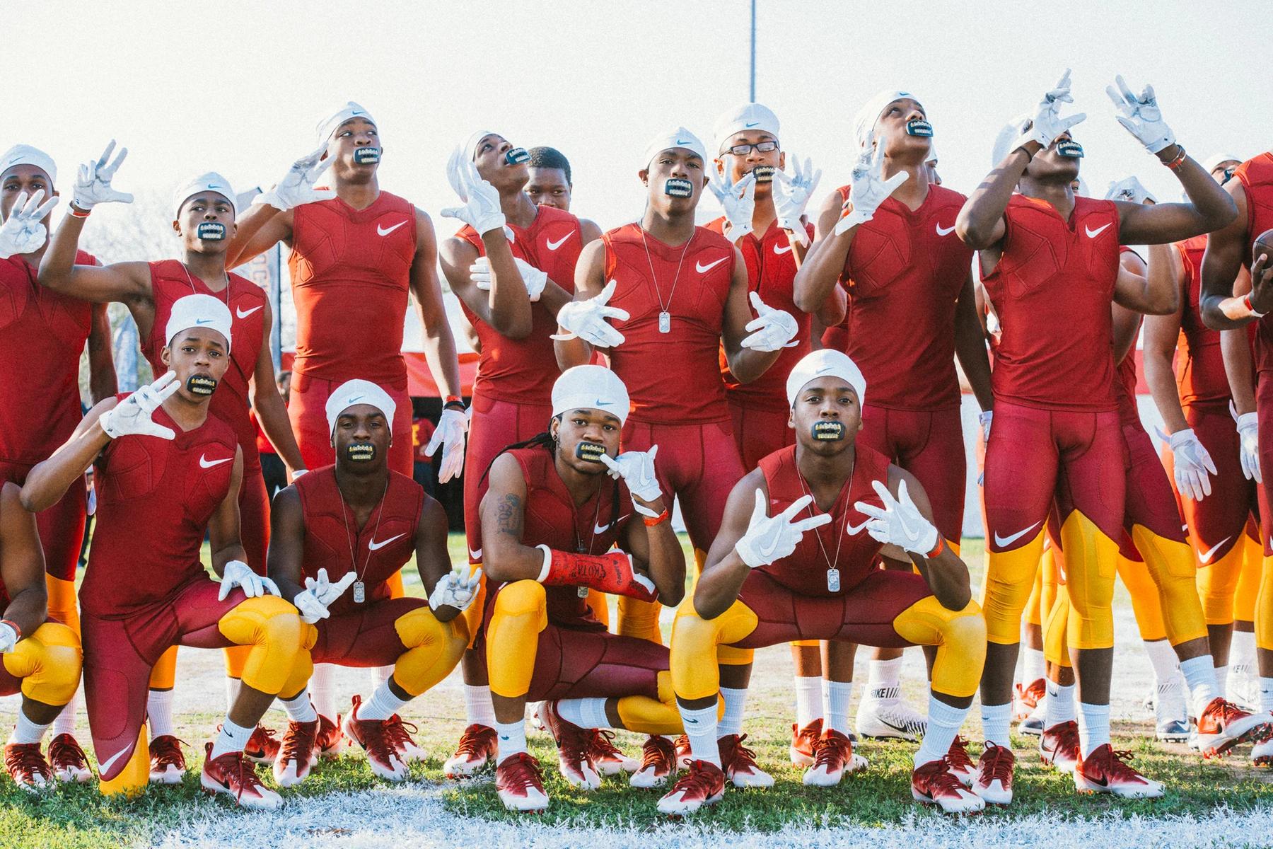 All the football player posing for pictures at the Niké SB 51 event