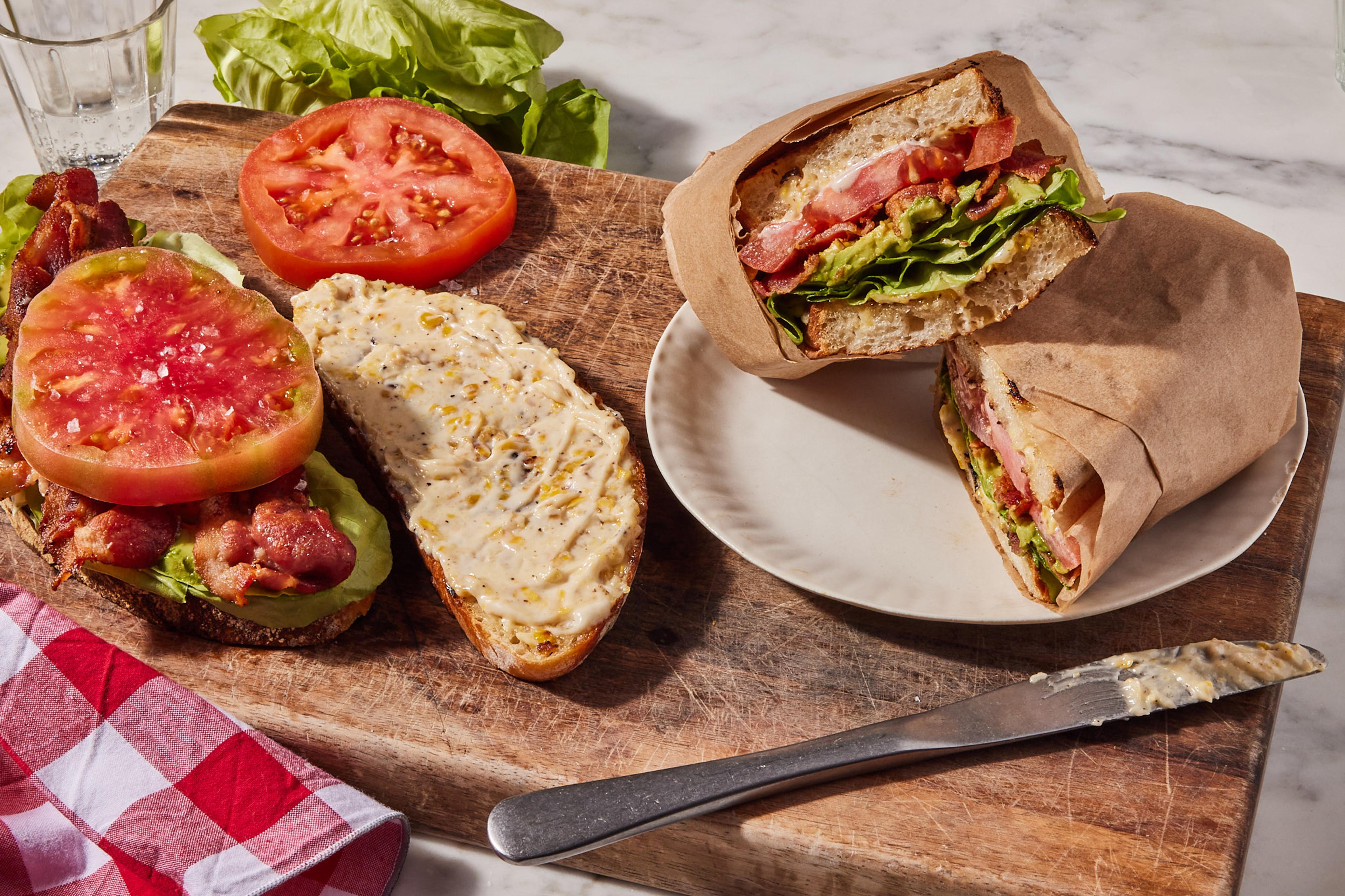 summer BLT on plate with corn mayo on side