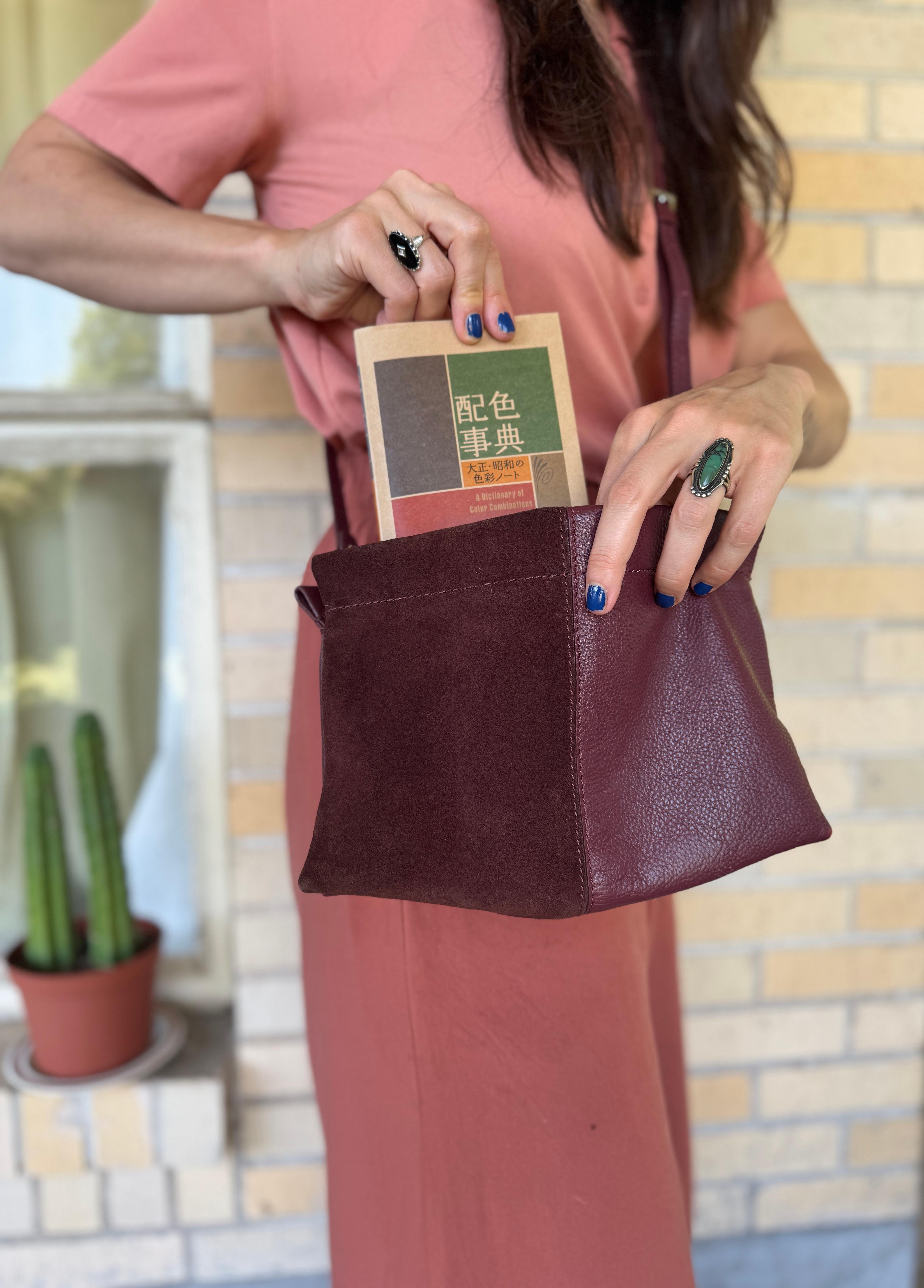book in small purse