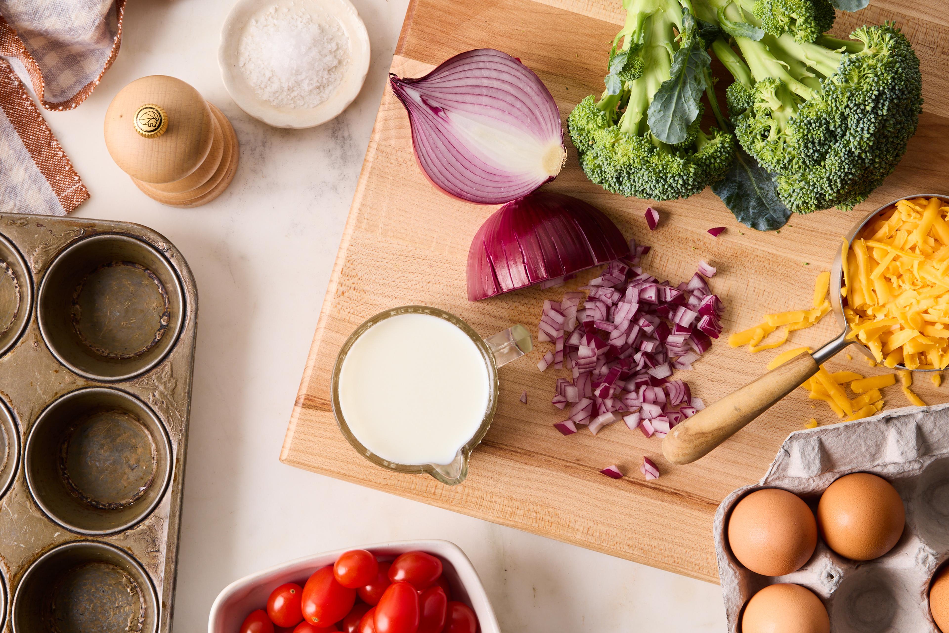 cutting board with chopped veggies 
