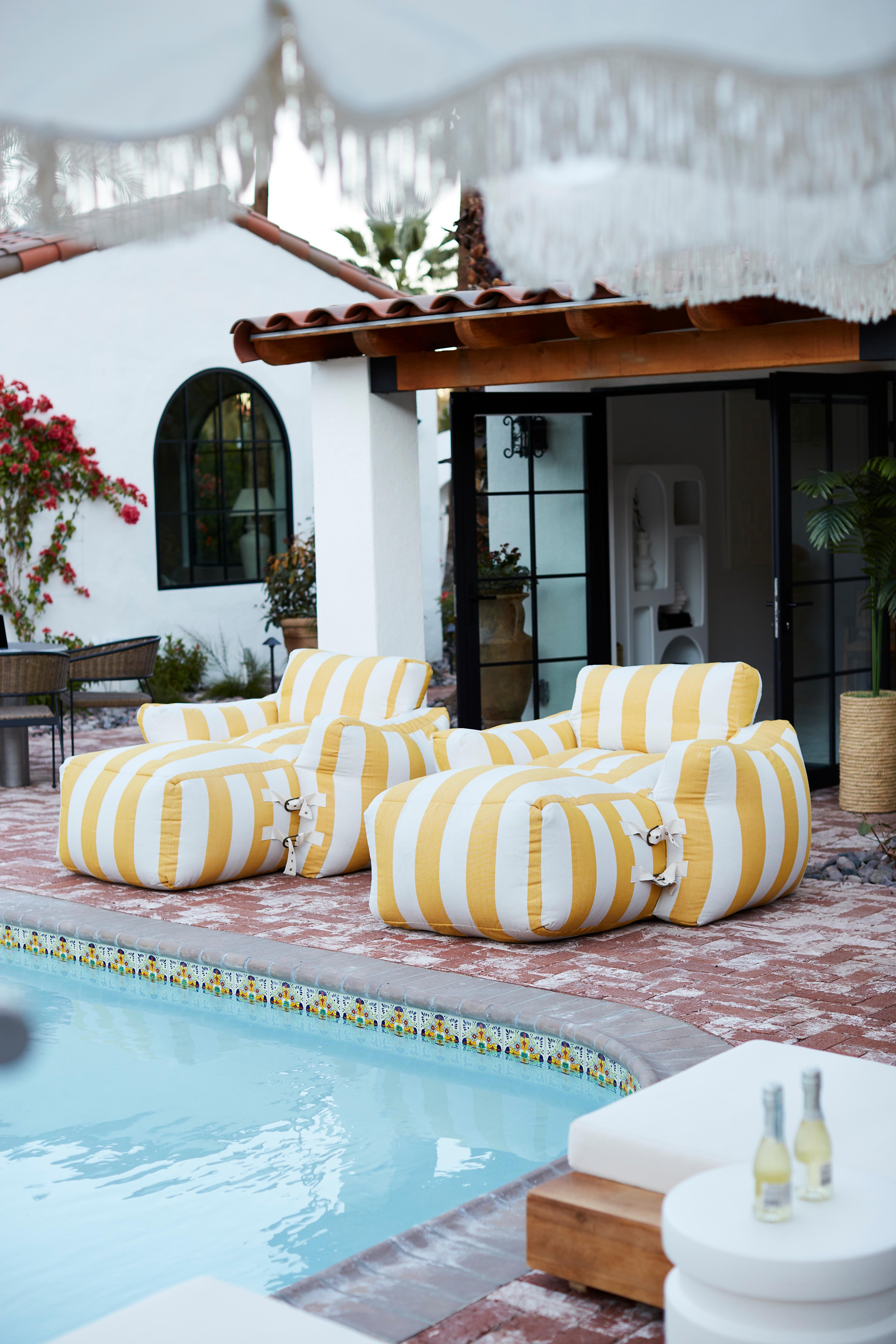 striped lounge chairs outside