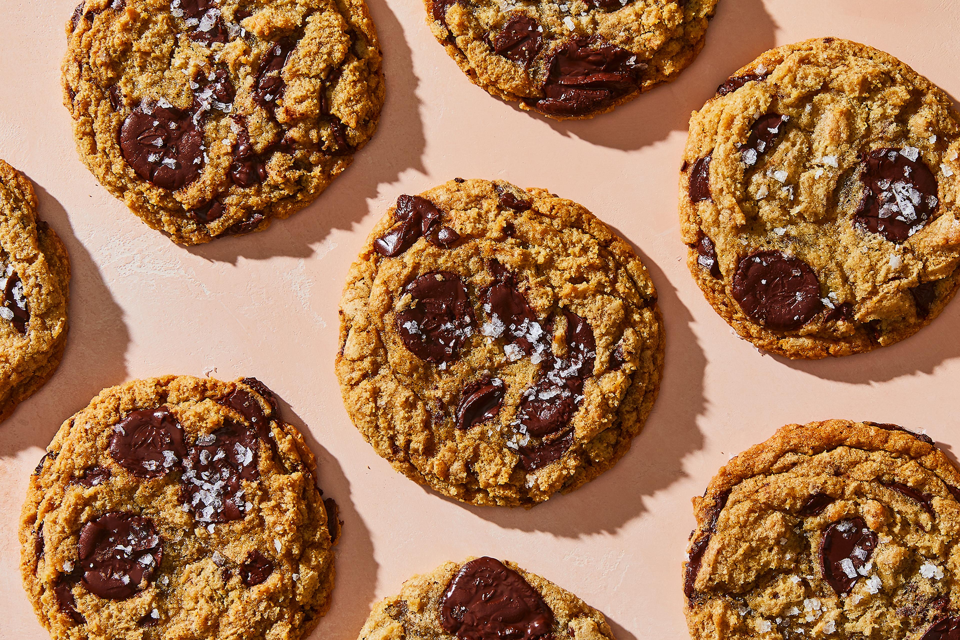 A bunch of chocolate chip cookies on table