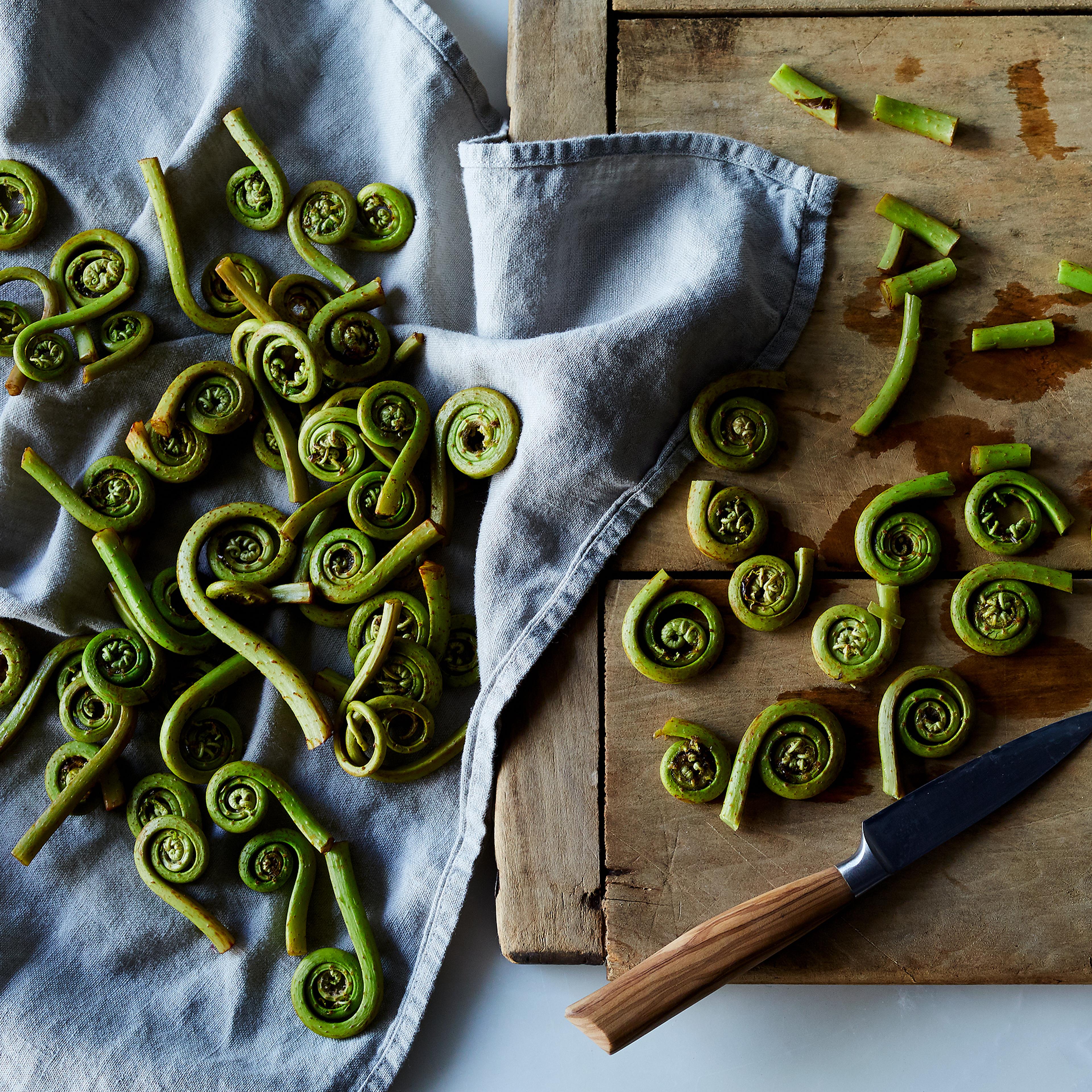 fiddleheads on cutting board