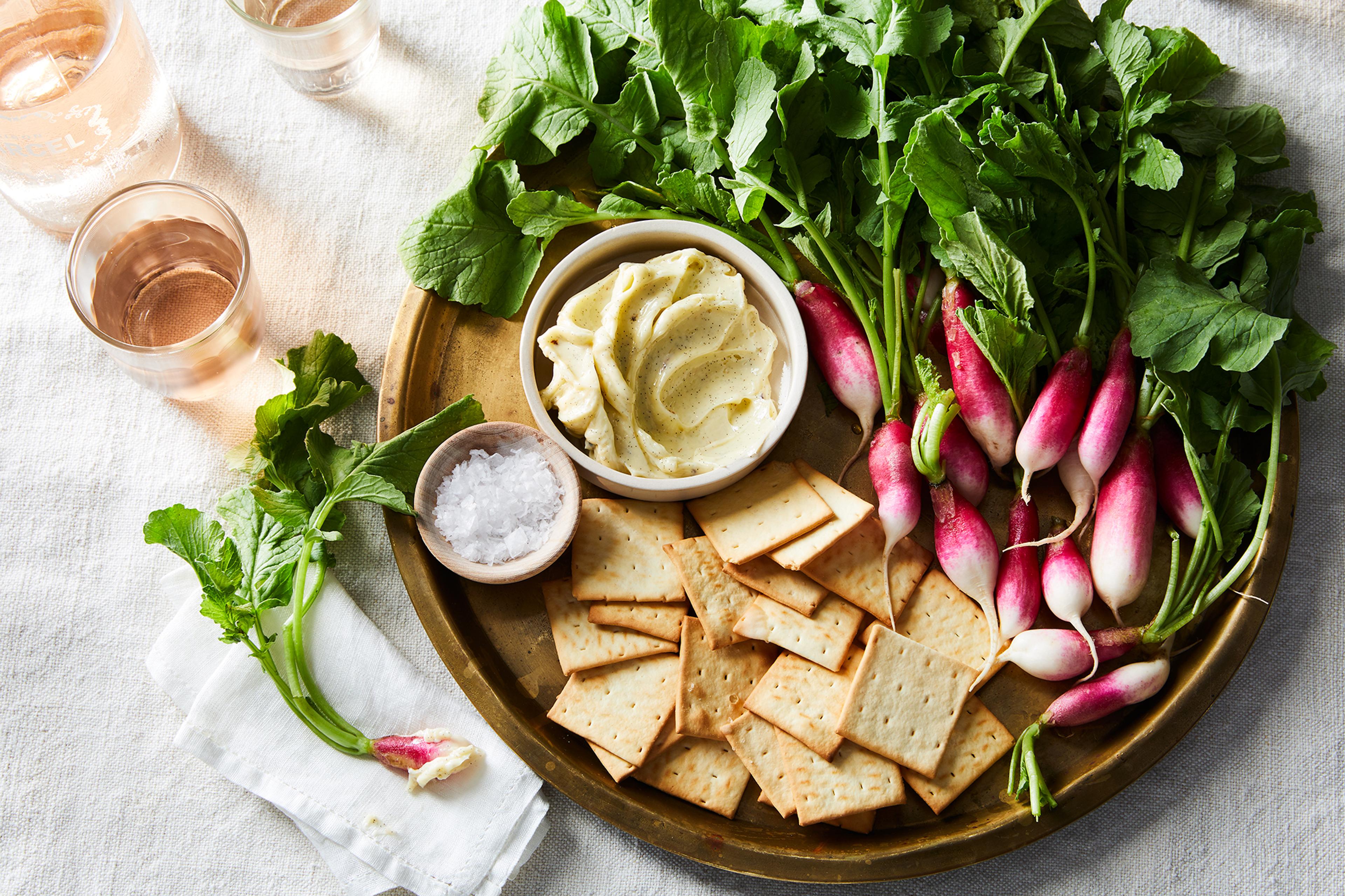 radishes with butter on board