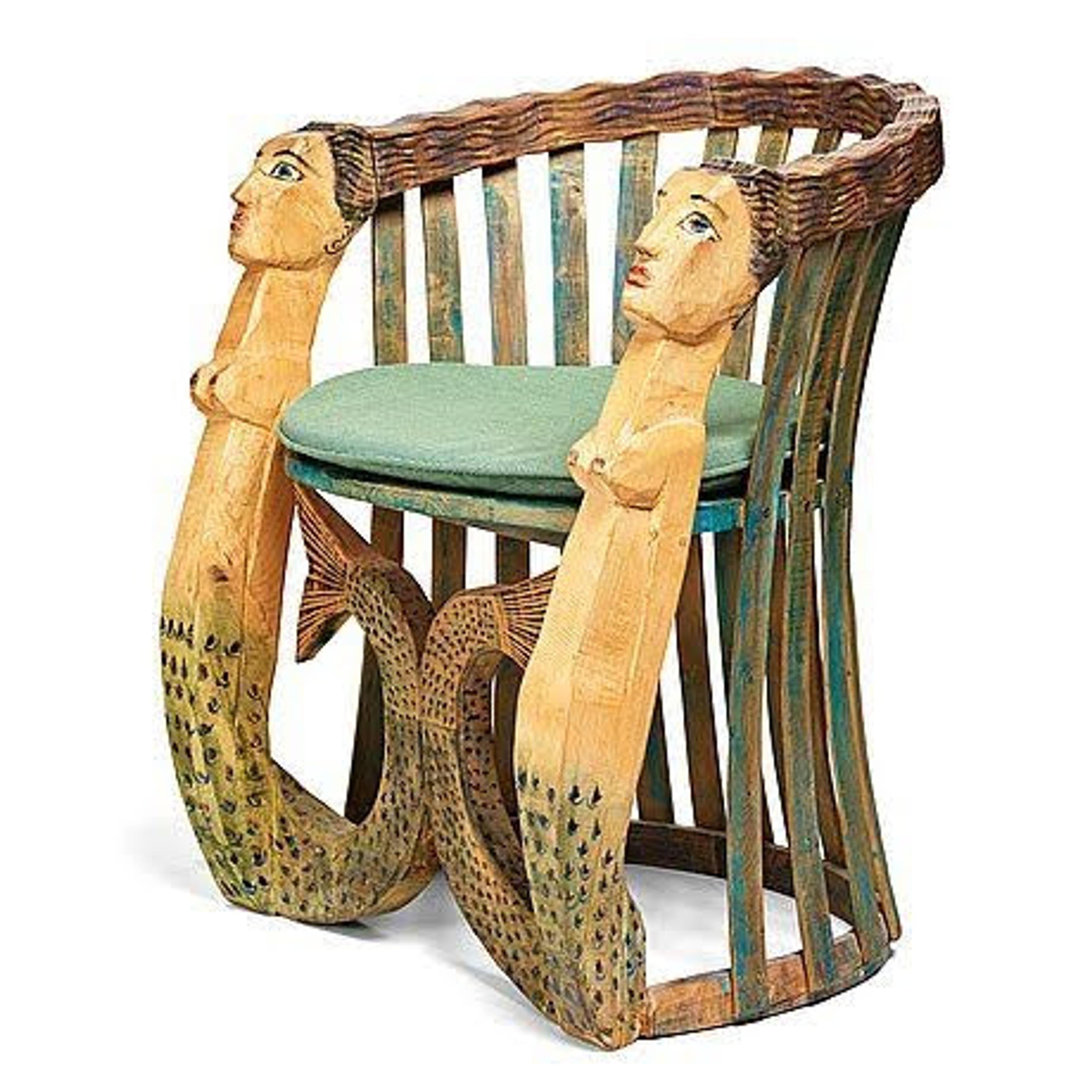 chair with faces on arms