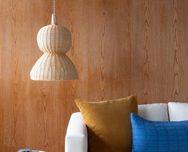 pendant lamp shade and corner of couch from Schoolhouse Electric