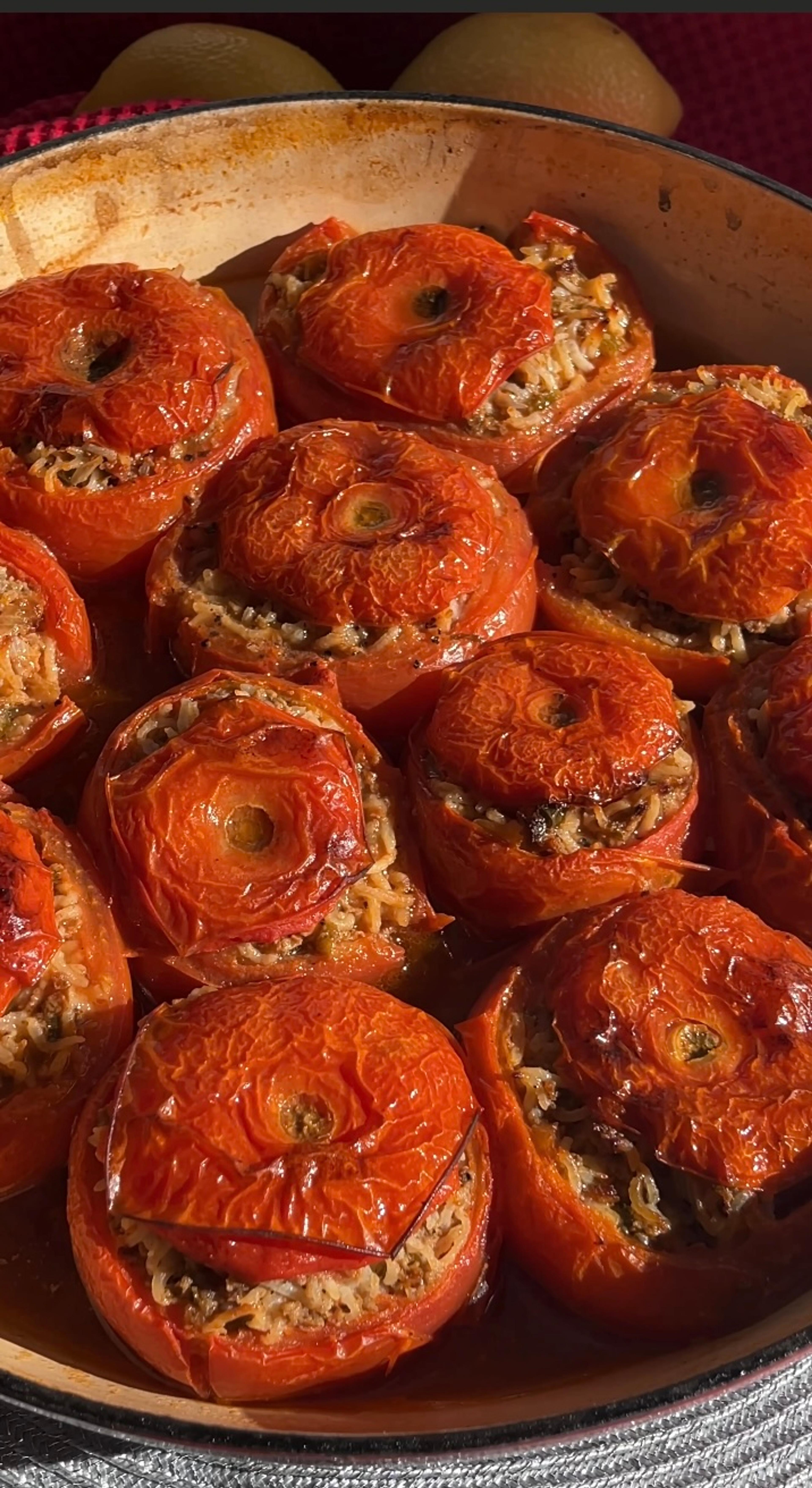tomato dolma in pan with spoon