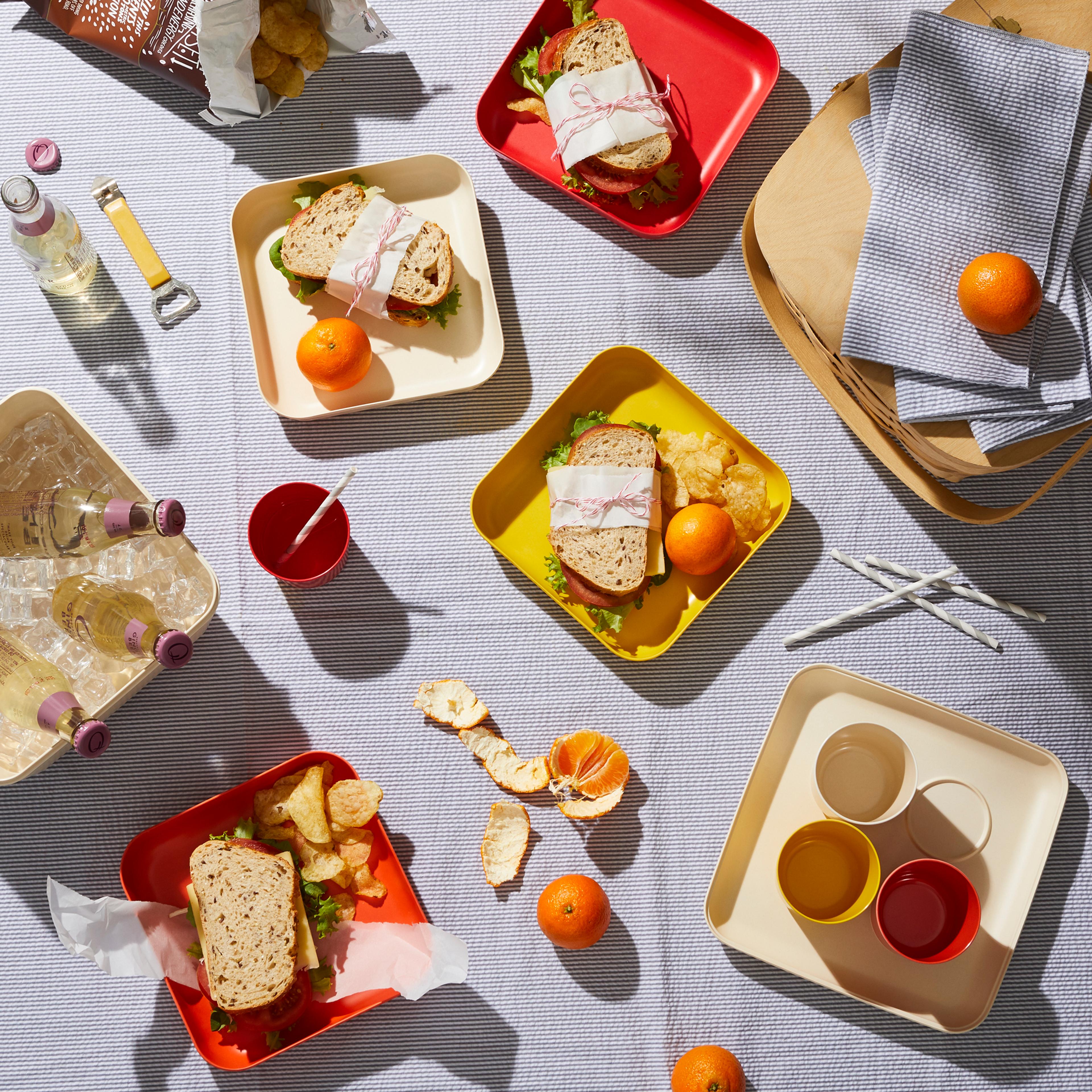 sandwiches on picnic blanket