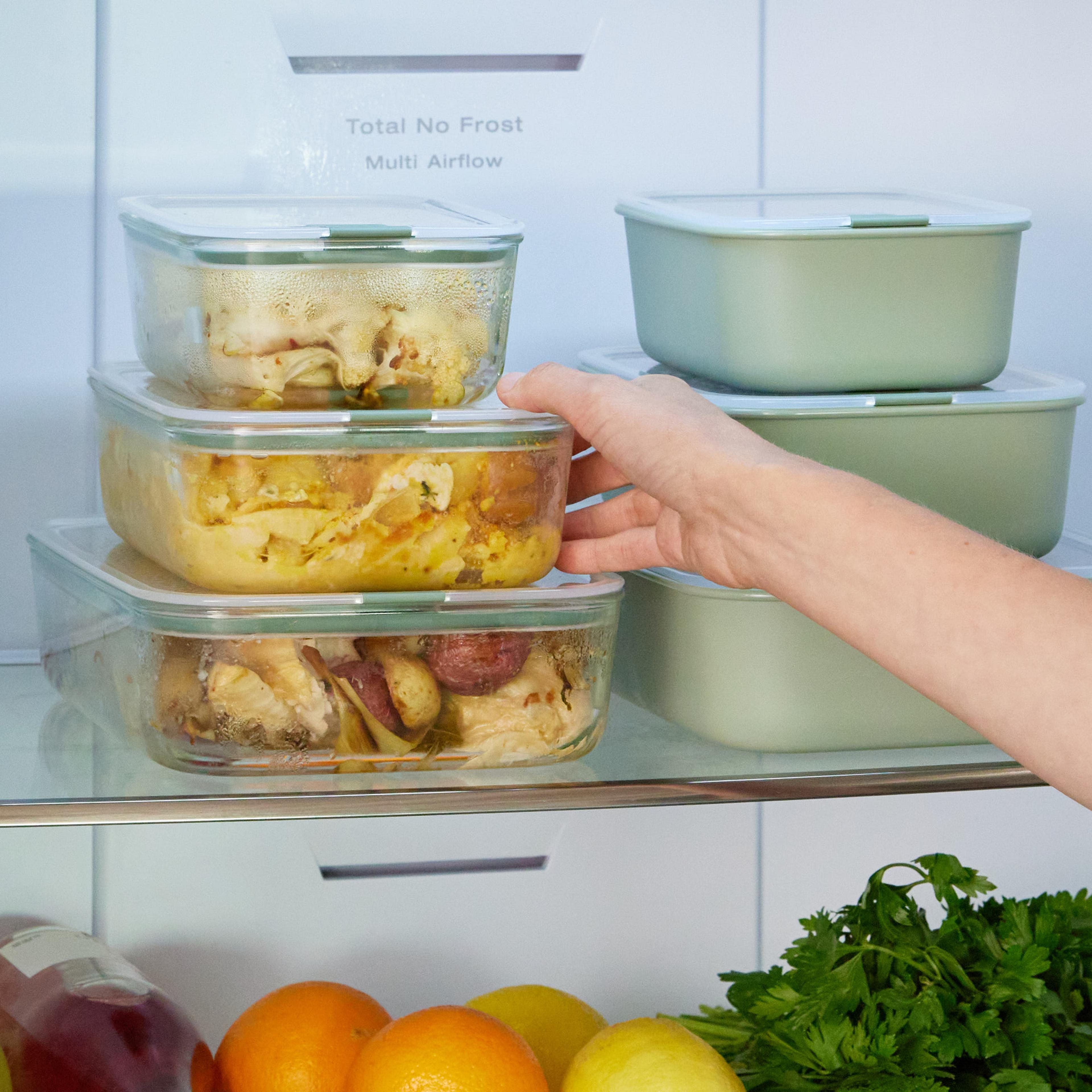 easyclip storage boxes in fridge with food for the week
