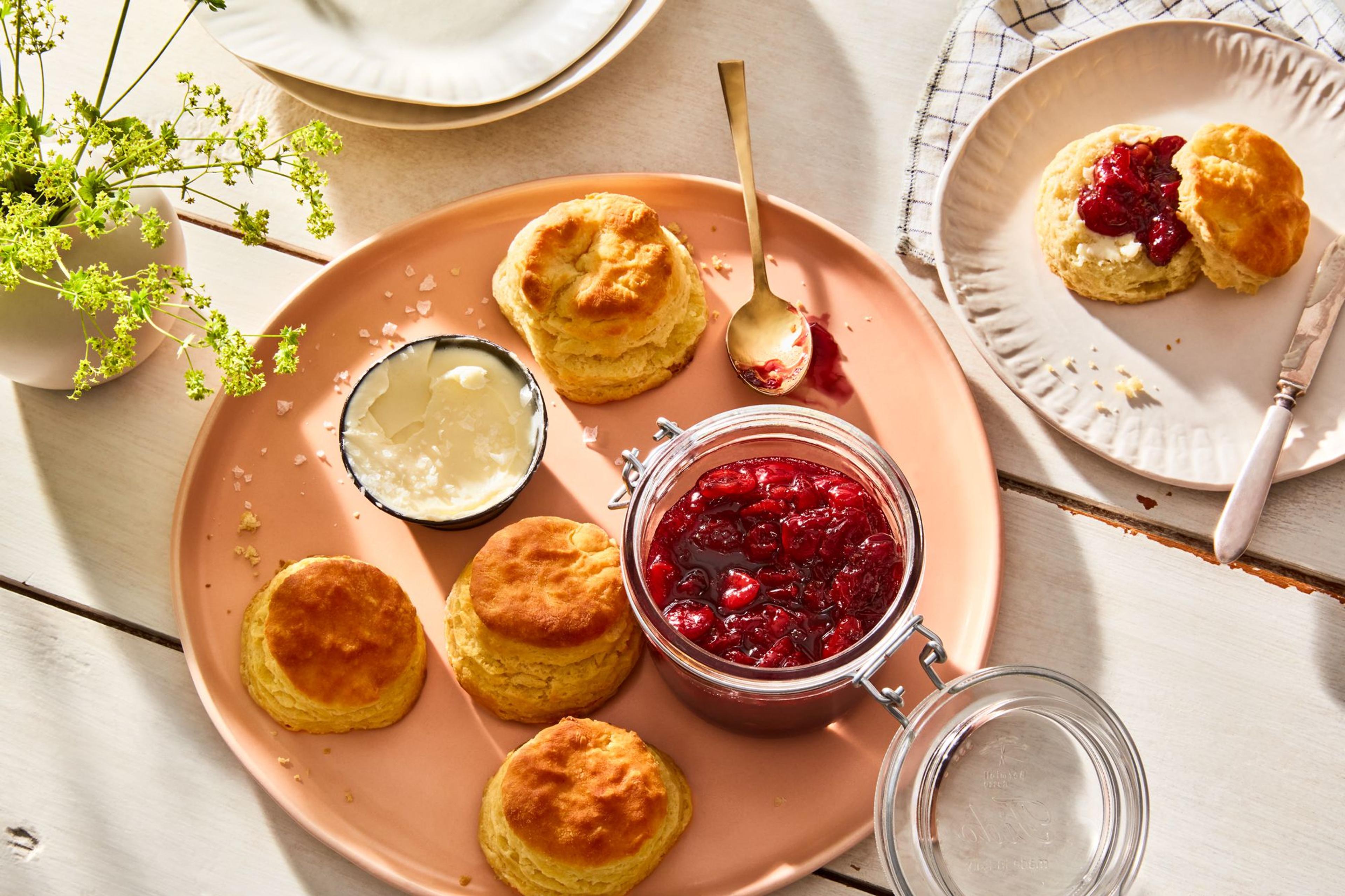 table of sour cherry lime jam and scones