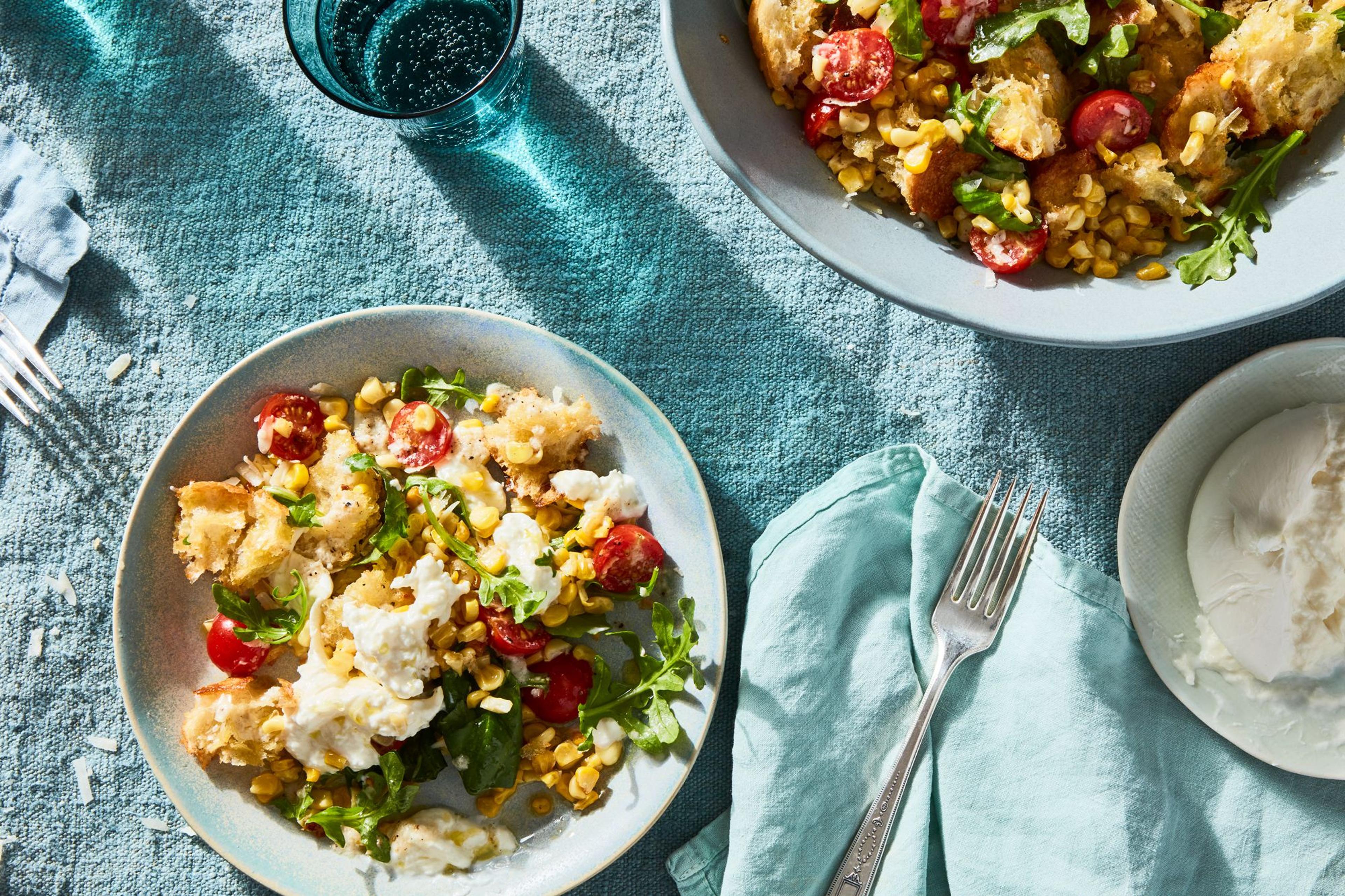 two bowls of corn salad outside