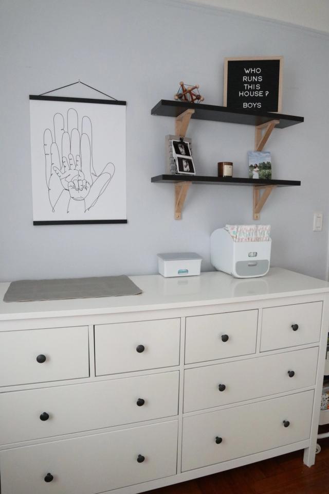 dresser with changing table on top