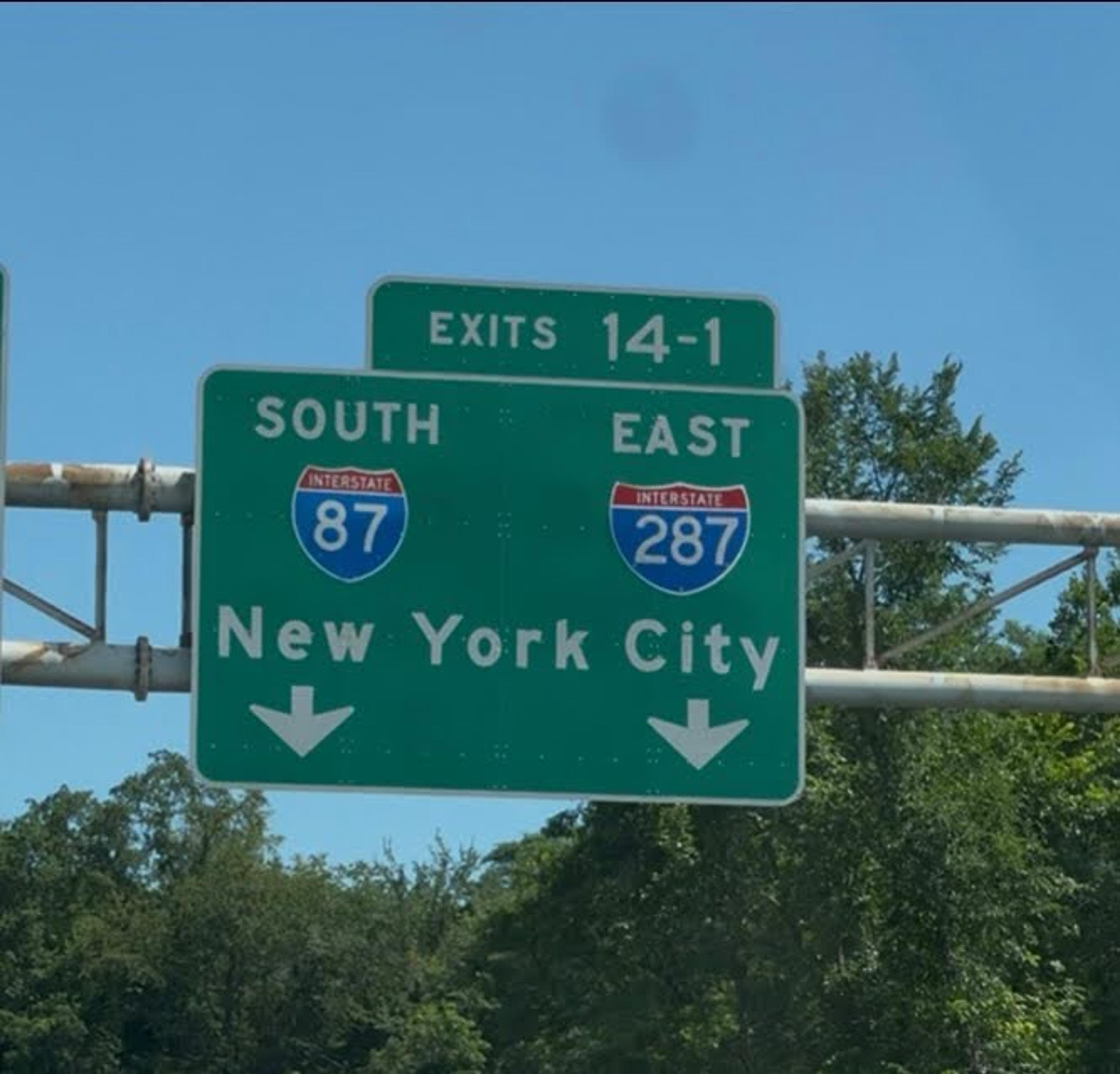 highway sign driving to New York