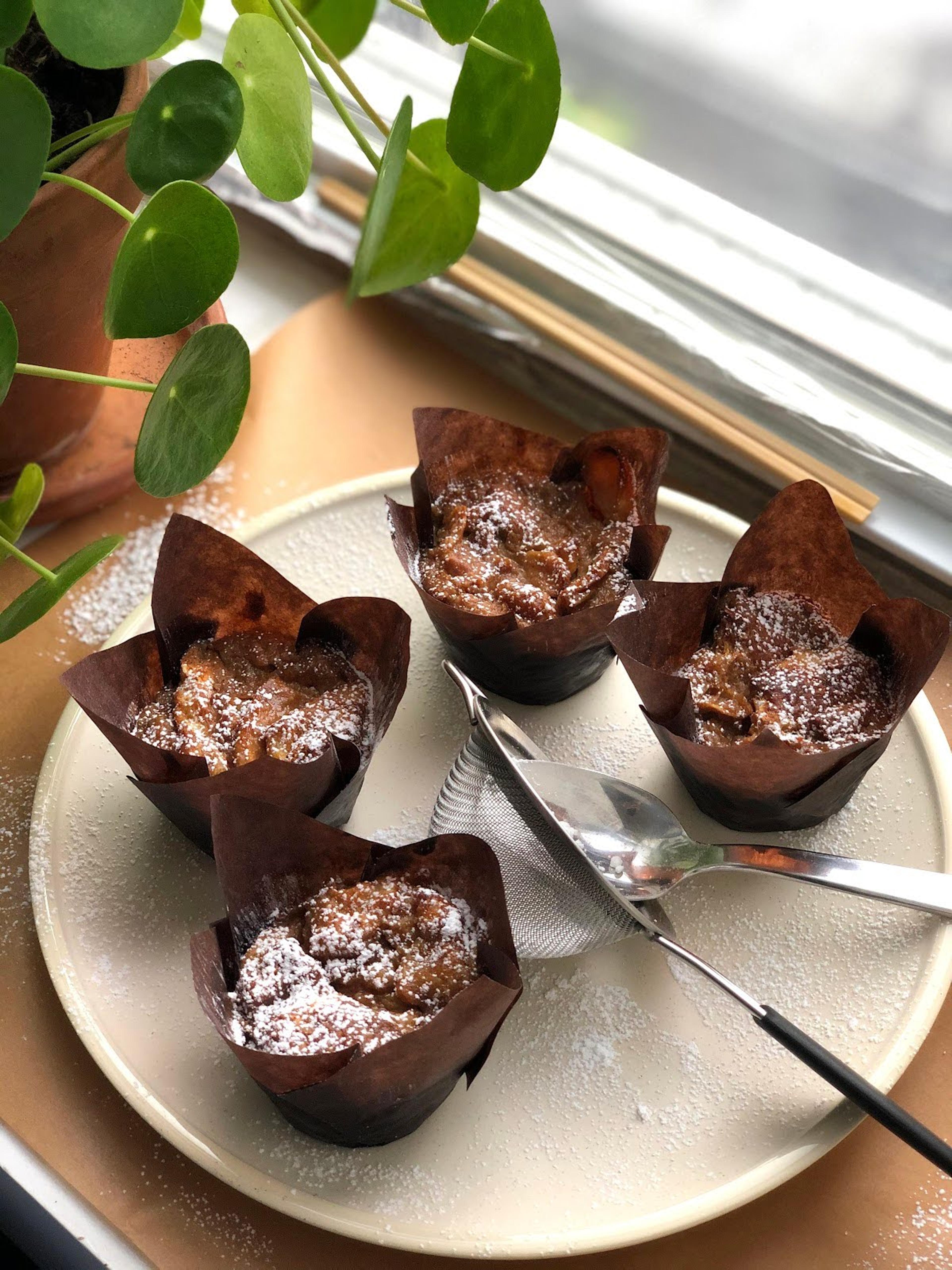 freshly-baked apple muffins on plate in food52 test kitchen