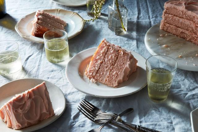 slices of pink champagne cake on table