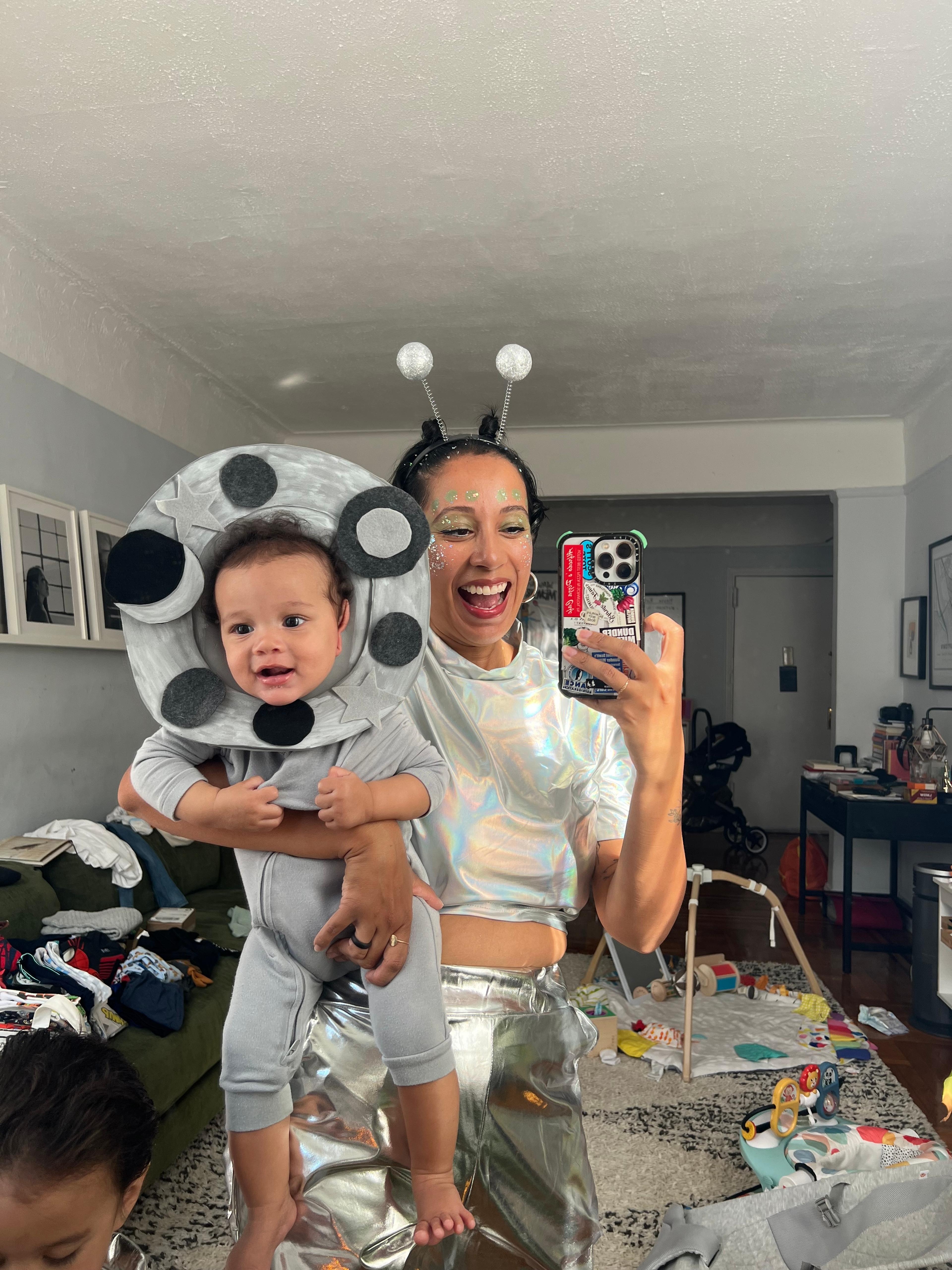 Rosdaly and her kid dressed up for Halloween