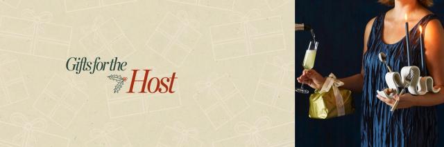 woman in dress holding a cocktail glass, panettone, candelabra, and most hosting gifts