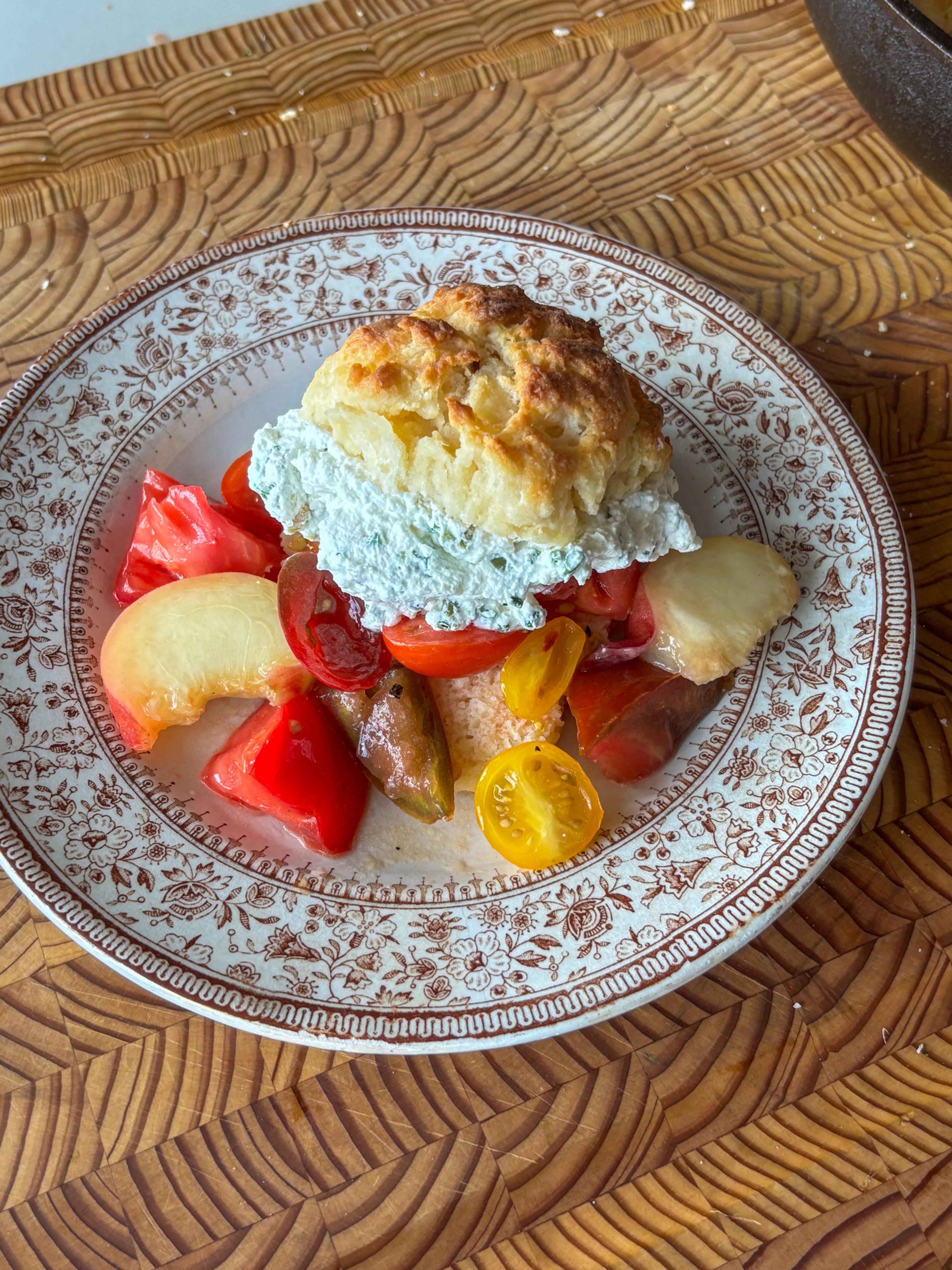 savory summer shortcake with tomatoes on a plate