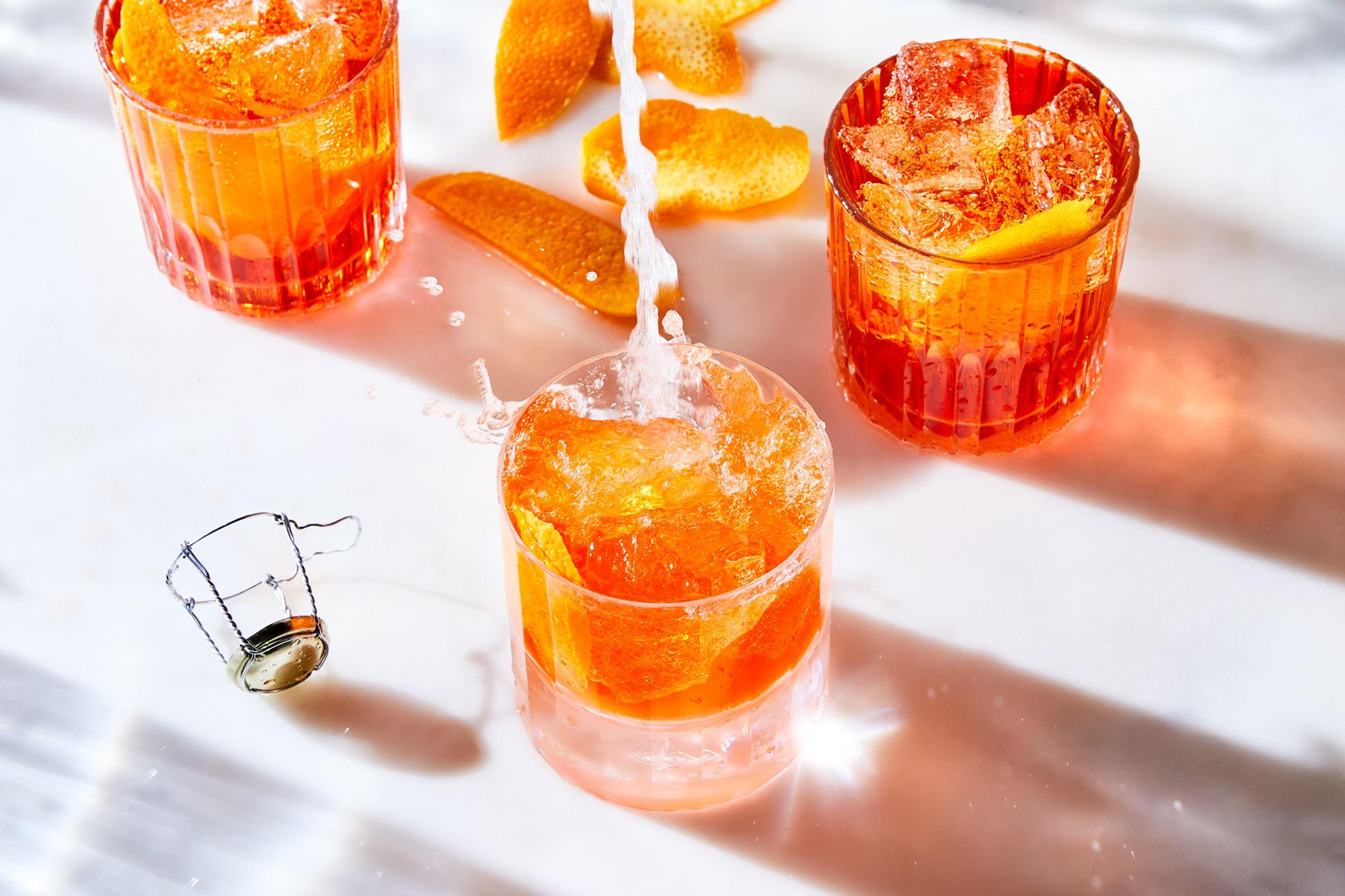 three glasses of Aperol sprtiz