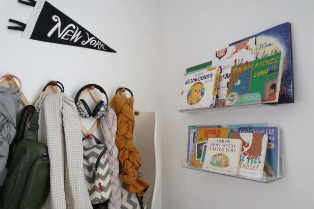 overhead storage and floating shelves with books