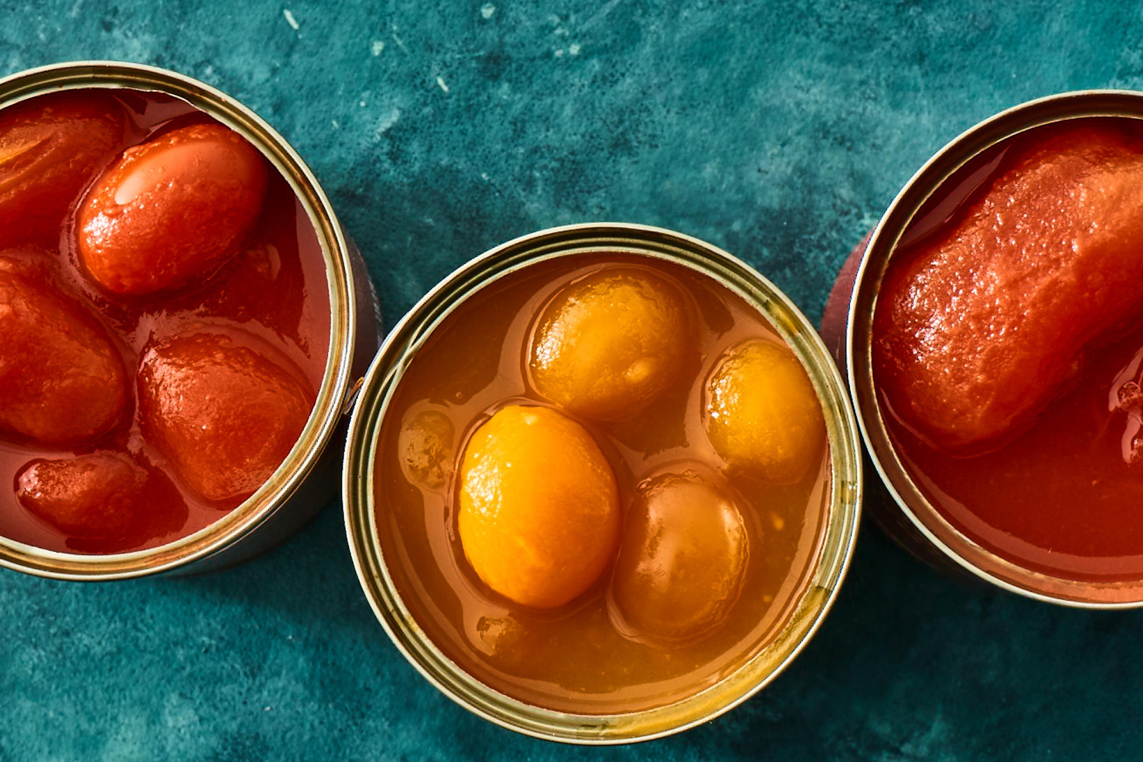 cans of open San Marzano tomatoes
