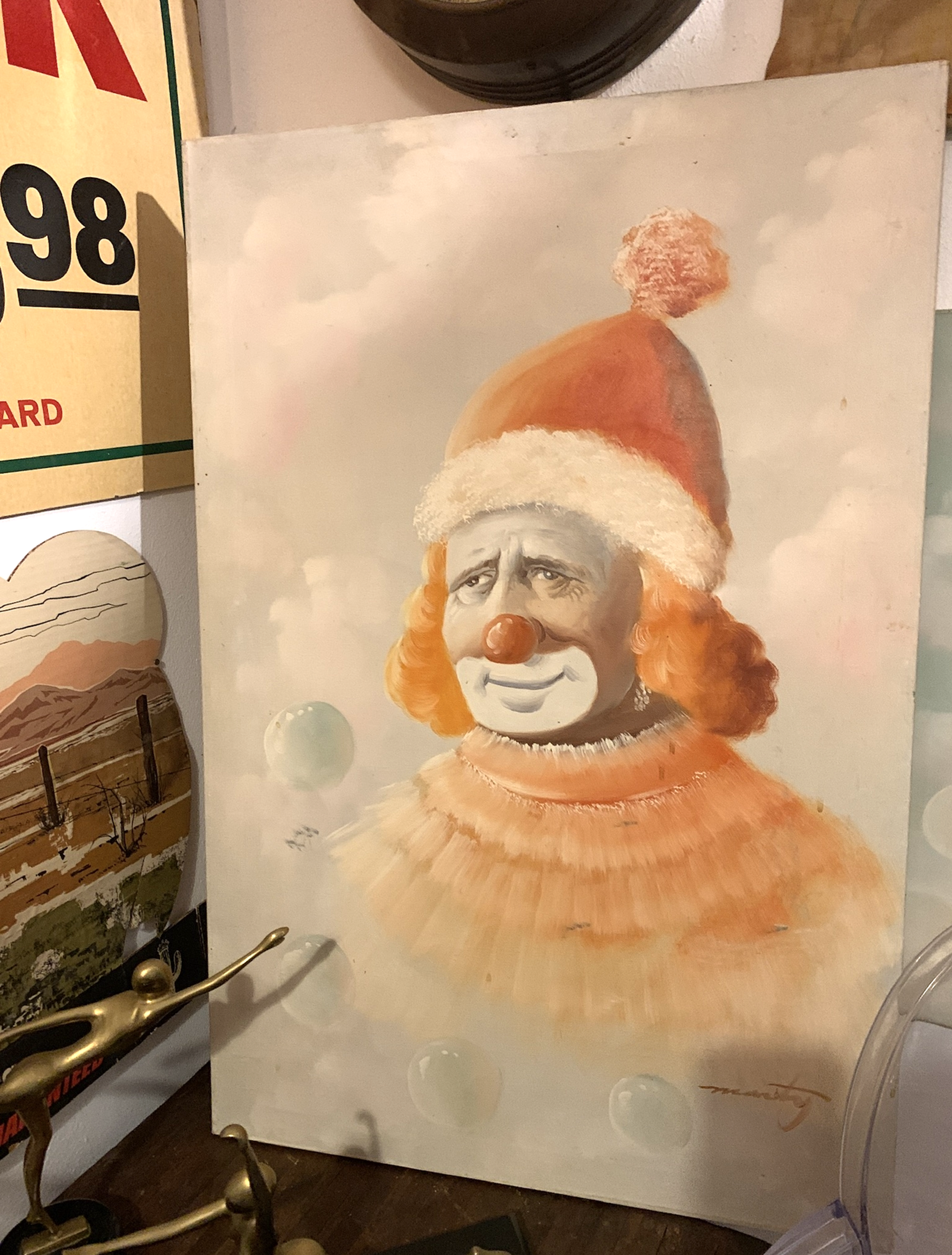 thrifted framed clown piece