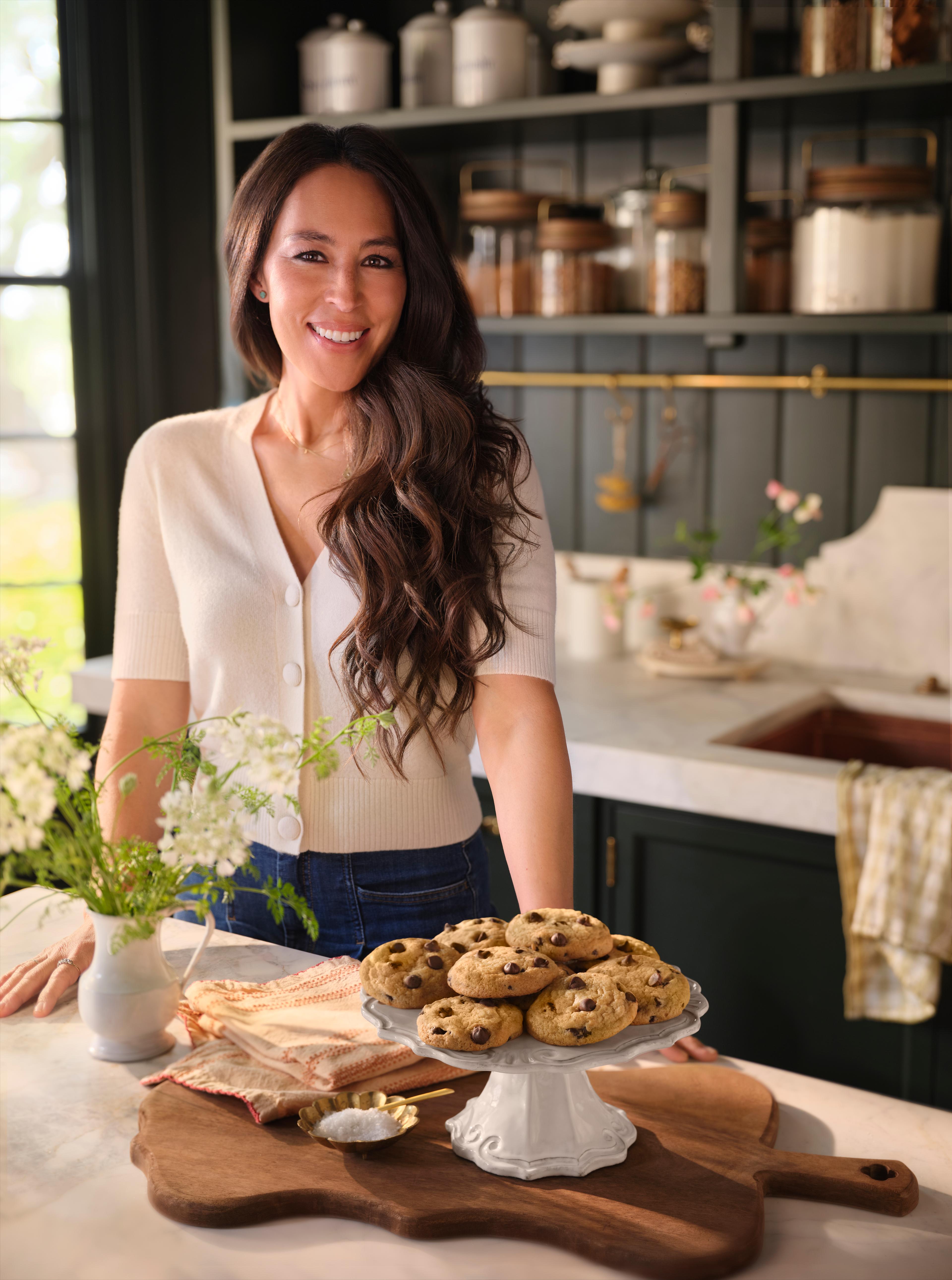 Joanna Gaines in Magnolia Test Kitchen with baked goods line