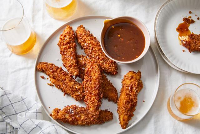 plate of chicken tenders and fries