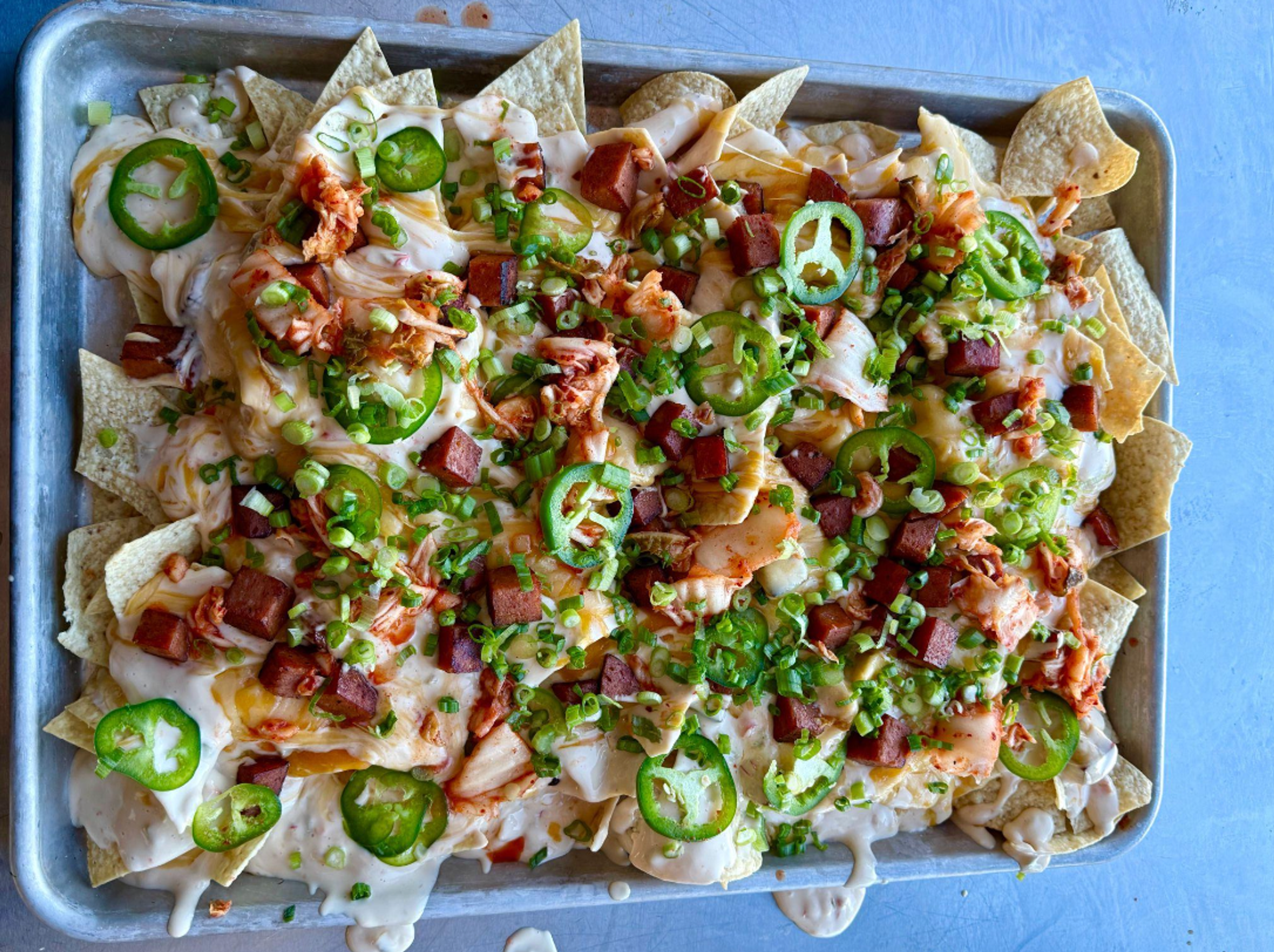 sheet-pan nachos on table in Food52 test kitchen