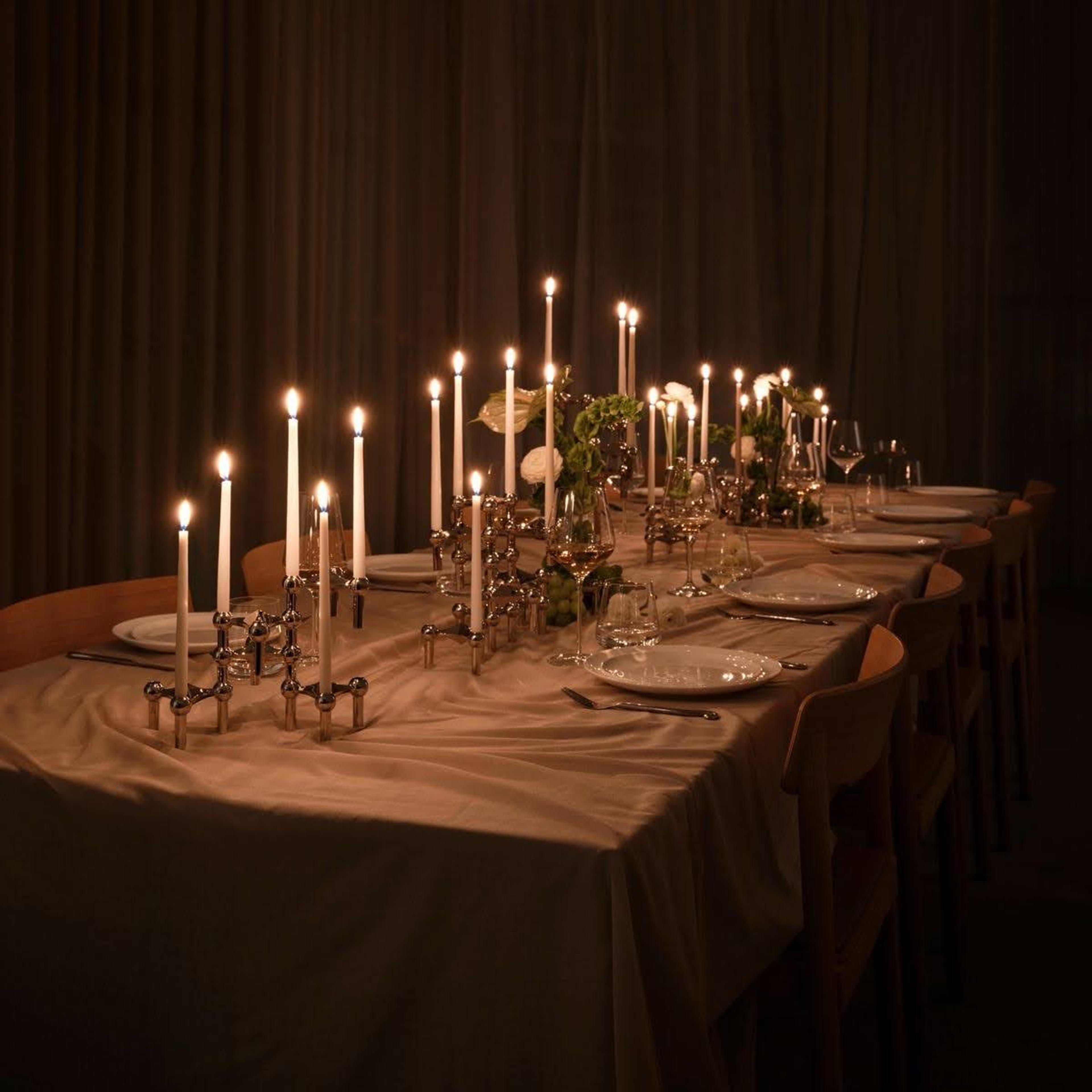 table with candle sticks down center