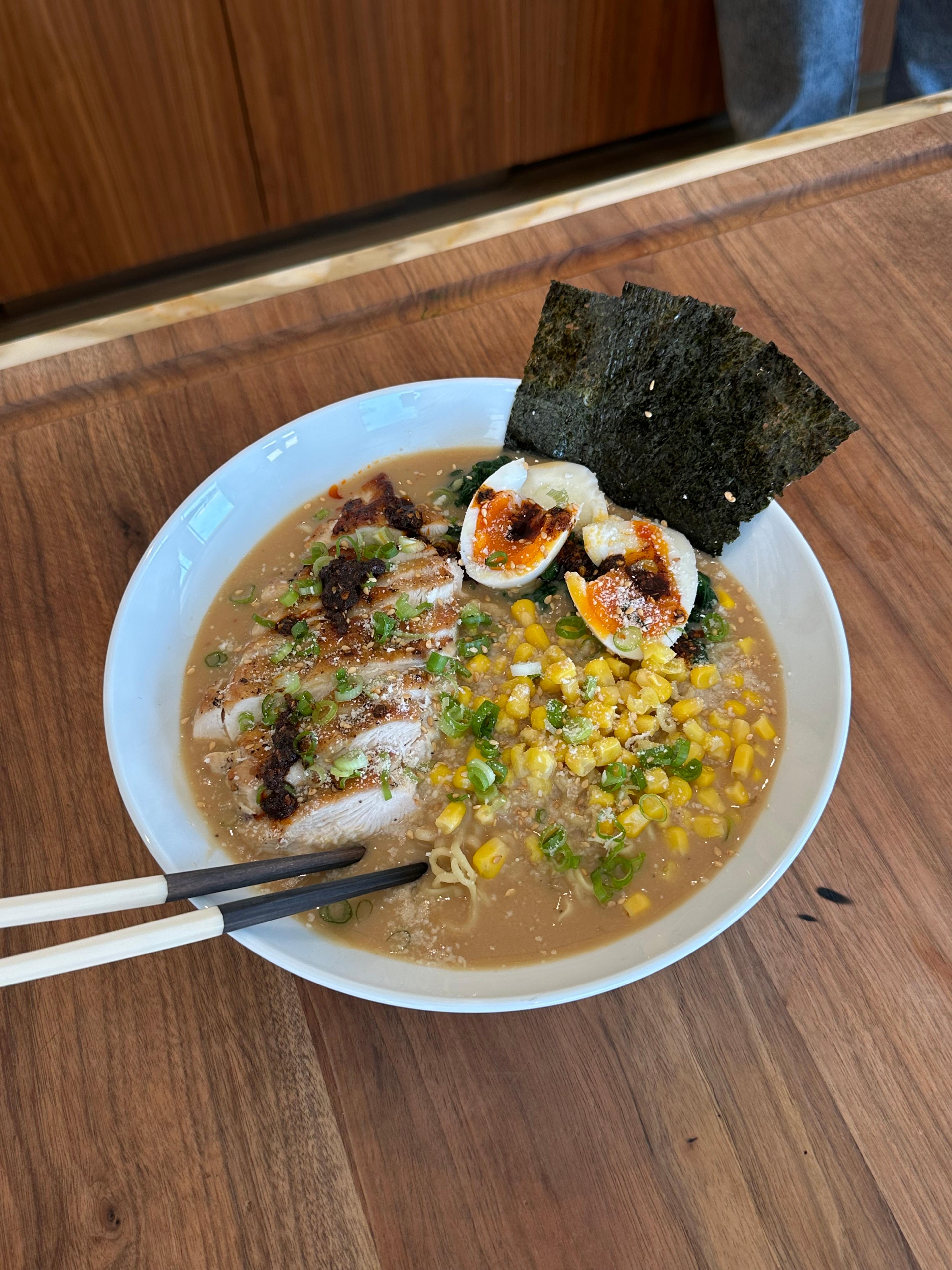 bowl of spicy miso chicken ramen on counter