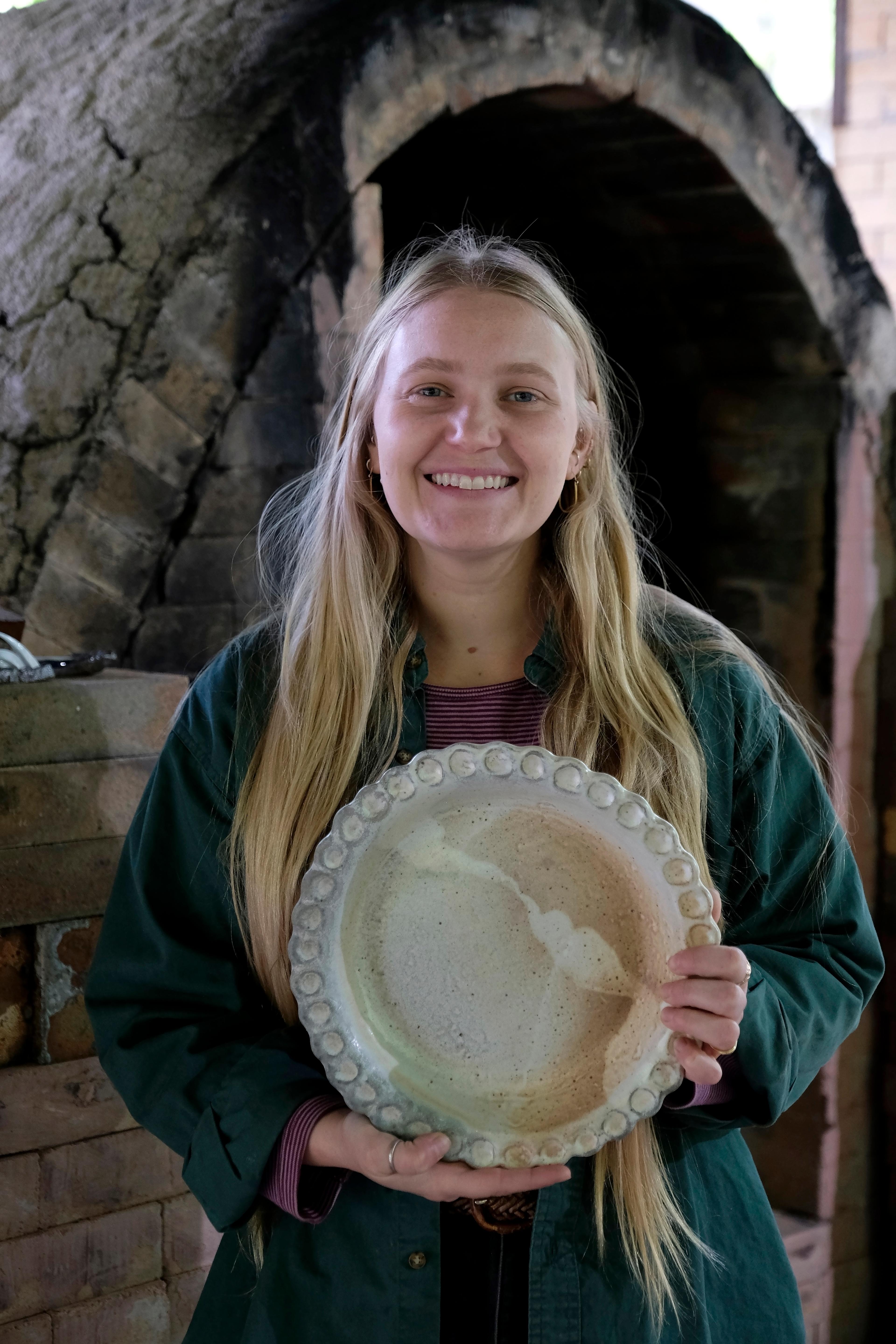 Meghan holding up her pie plate