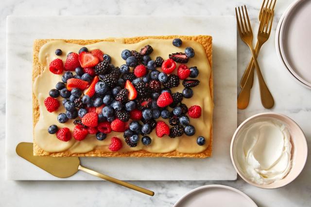 Berries on top of a cream-filled sponge cake