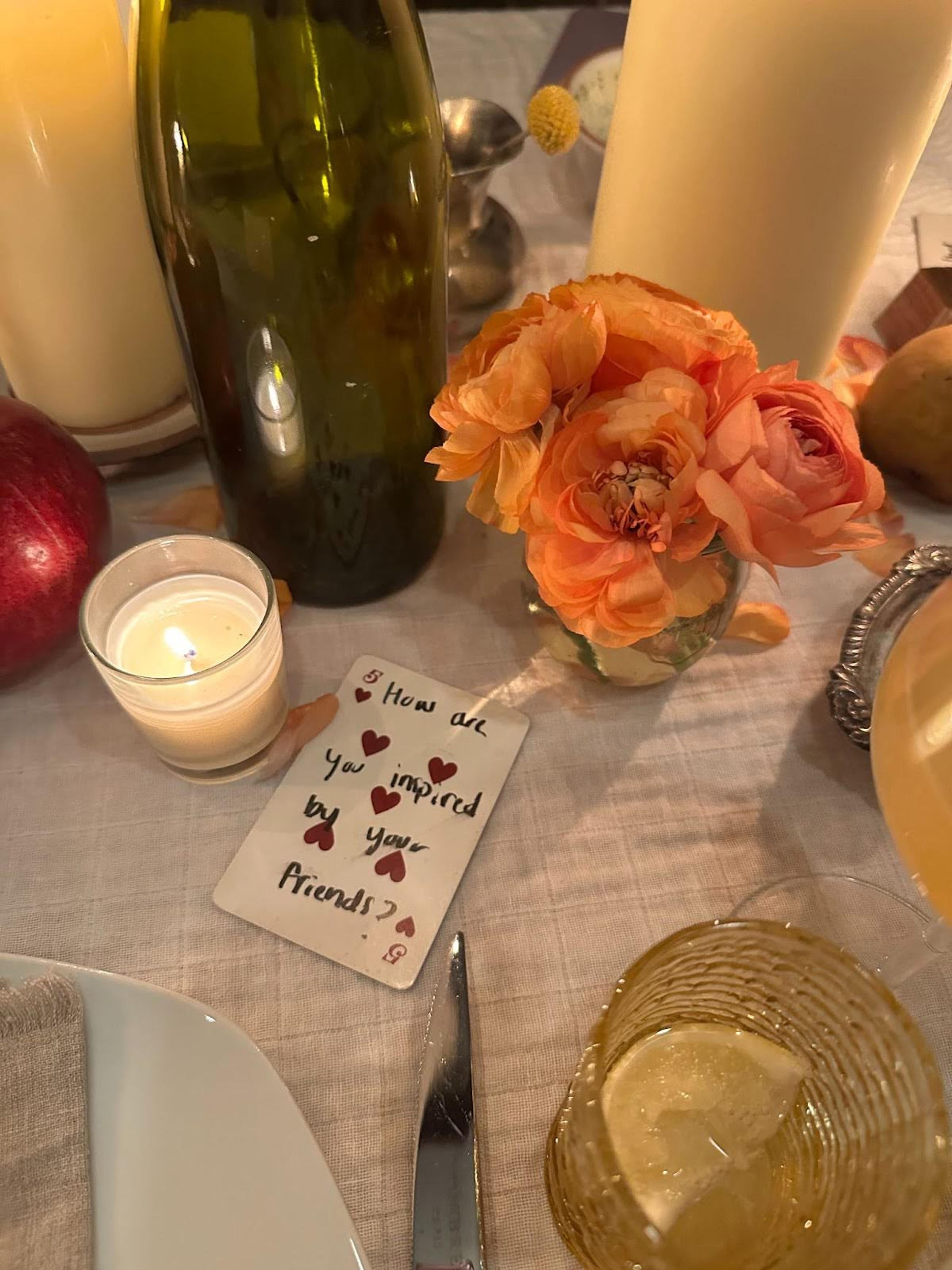 table setting with flowers and cards