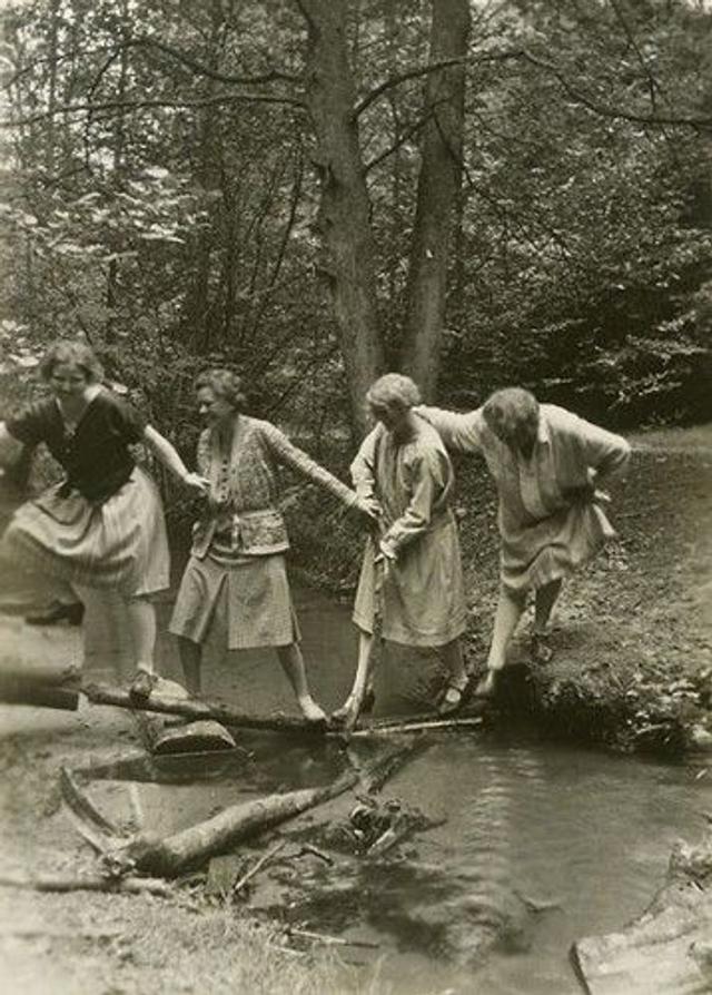 witches dancing by water