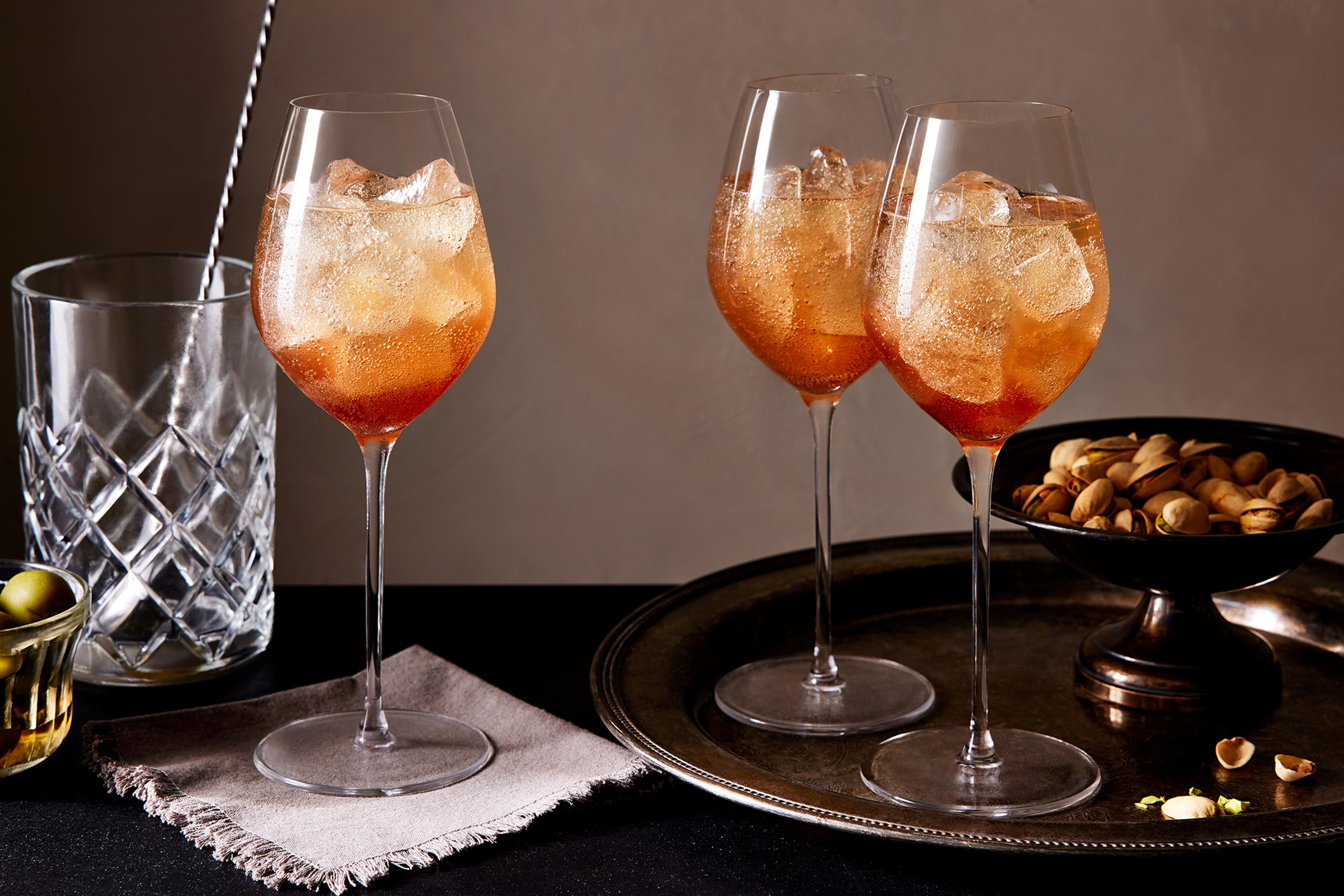 3 campari spritz on table