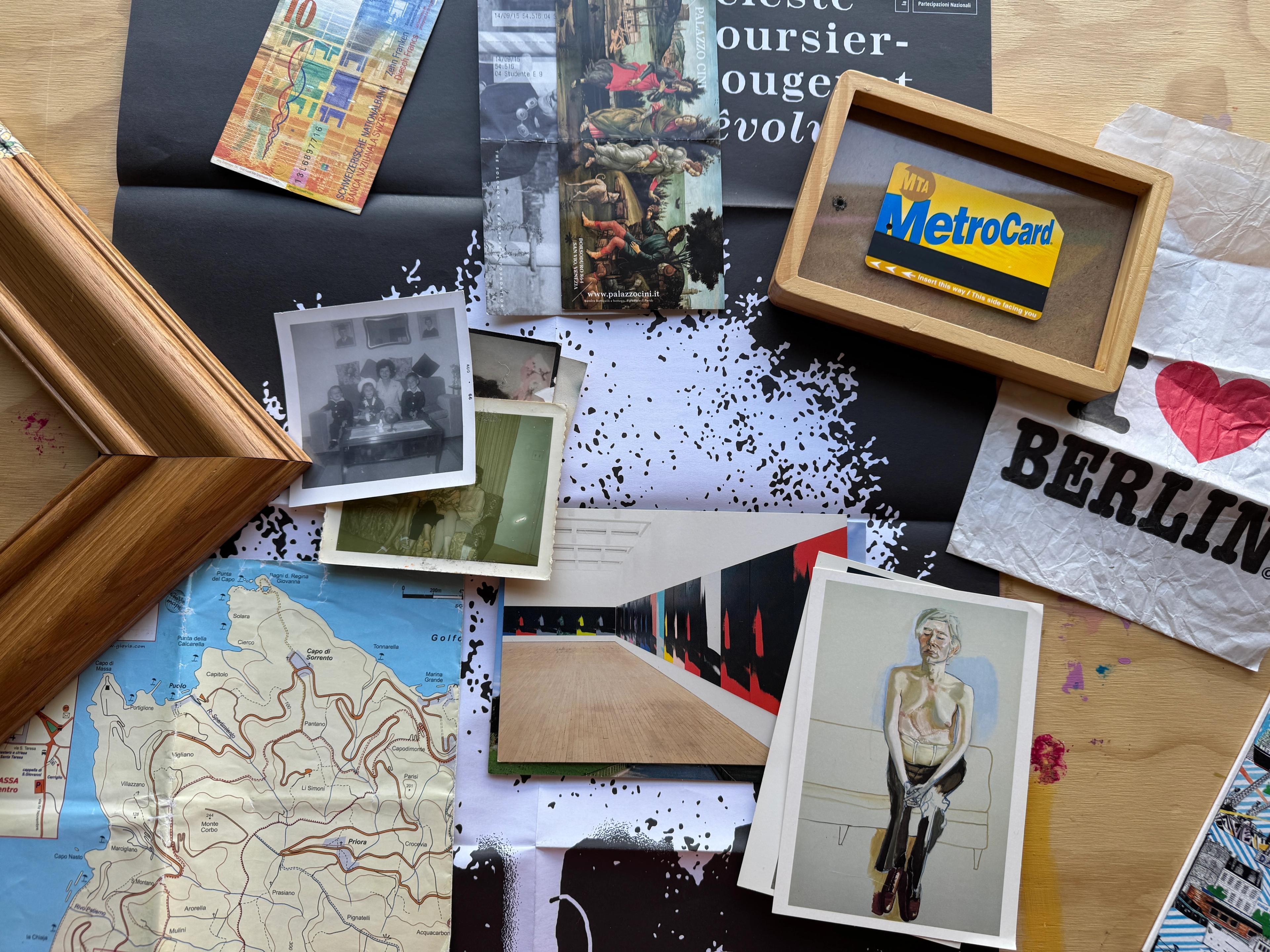 assortment of thrifted wall art on ground