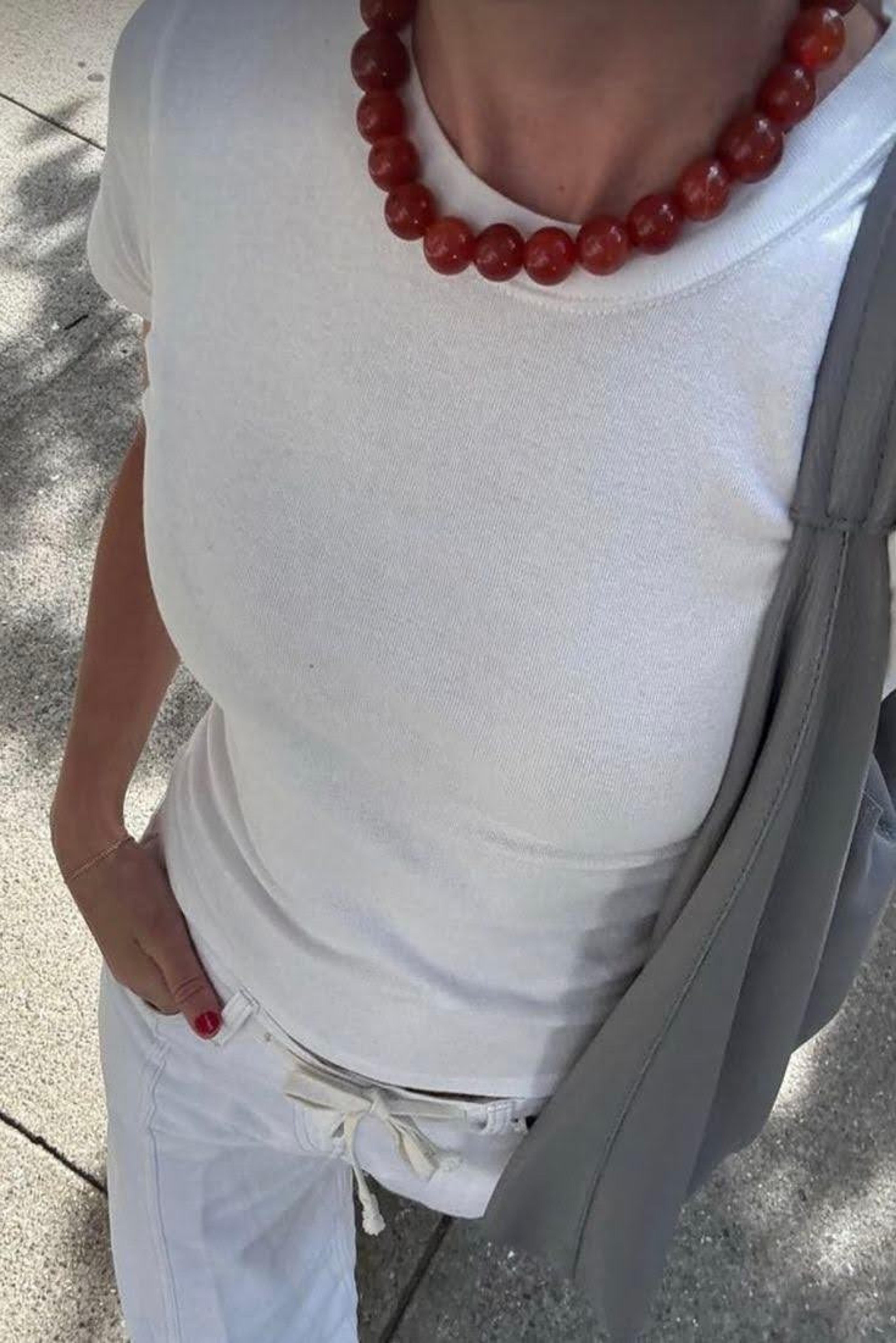 woman wearing chunky necklace