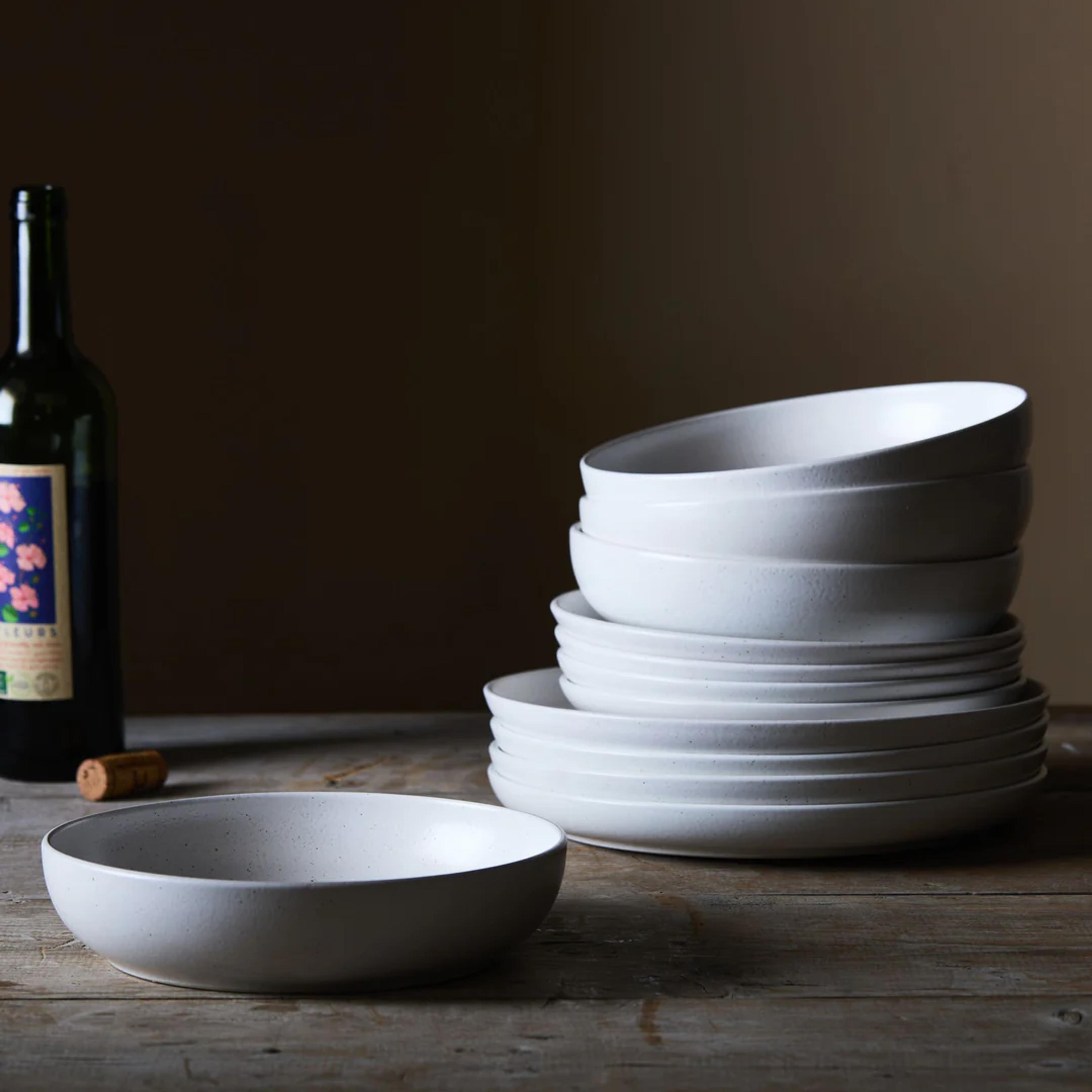stacked white plates