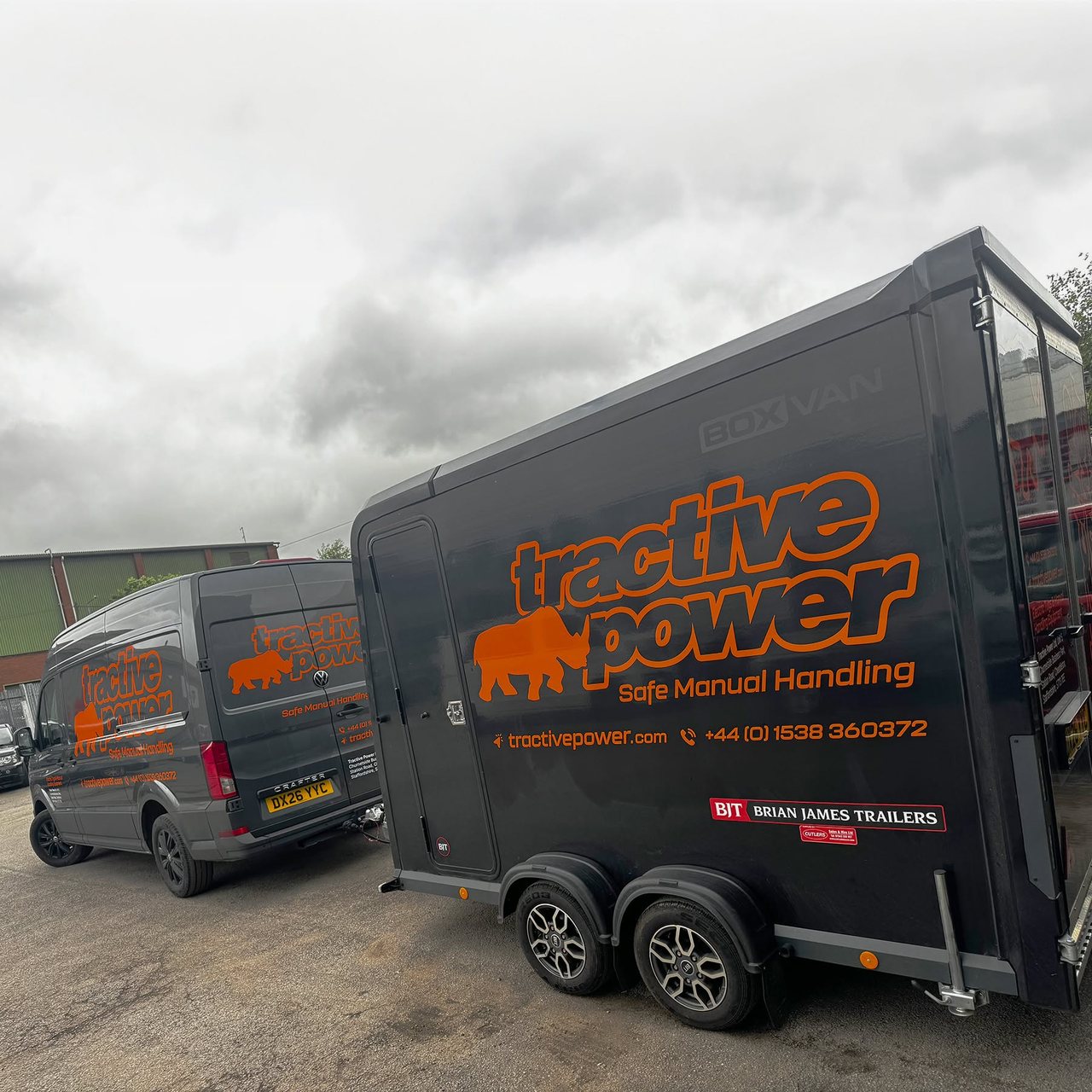 Tractive Power branded vehicle graphics in context.