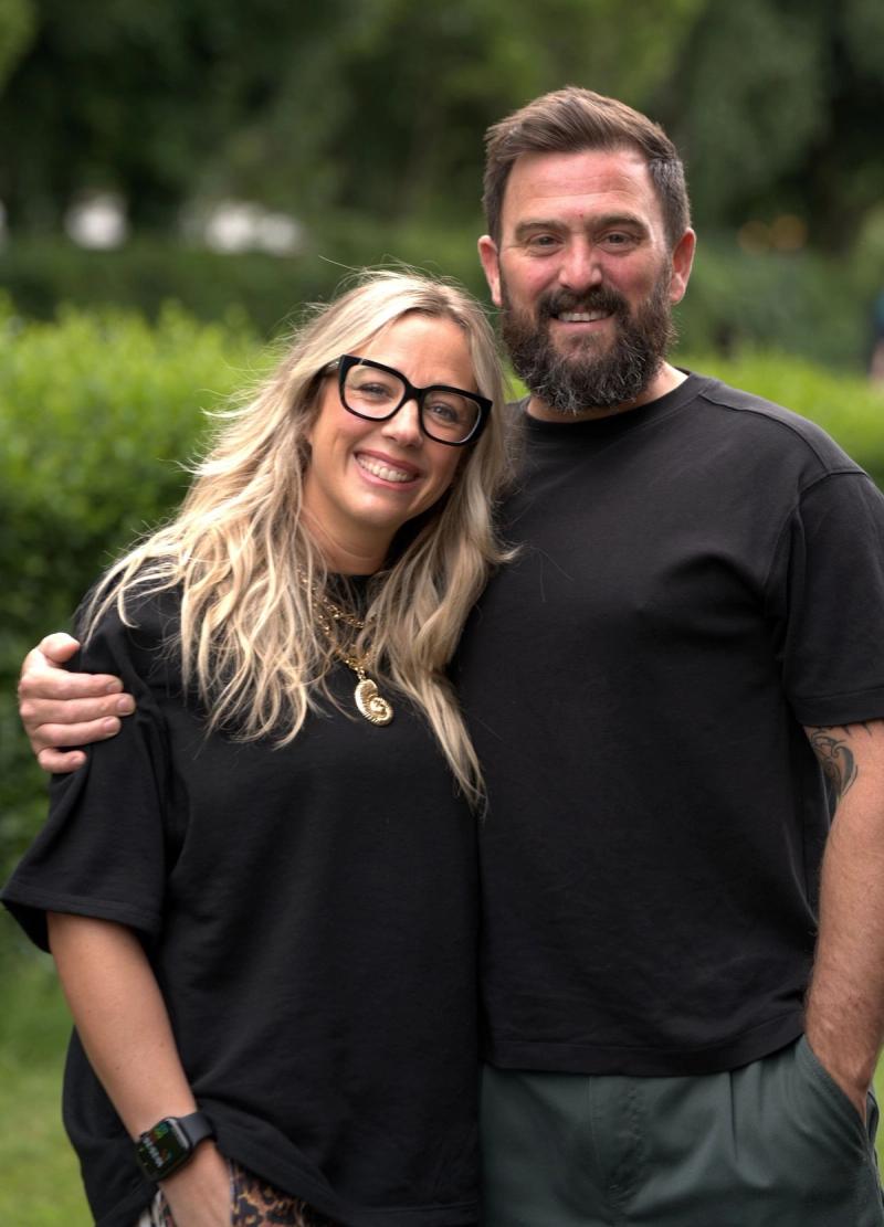 Kenny and Nicola McCoosh smiling together outdoors