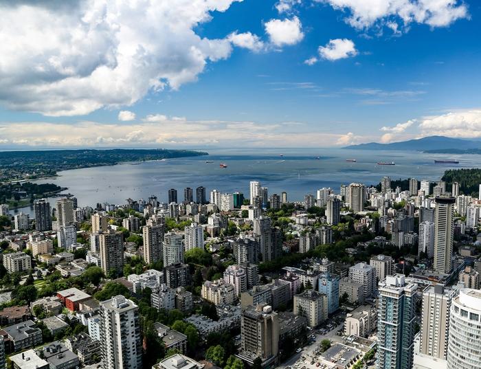 An aerial photo of downtown Vancouver featuring numerous condo buildings