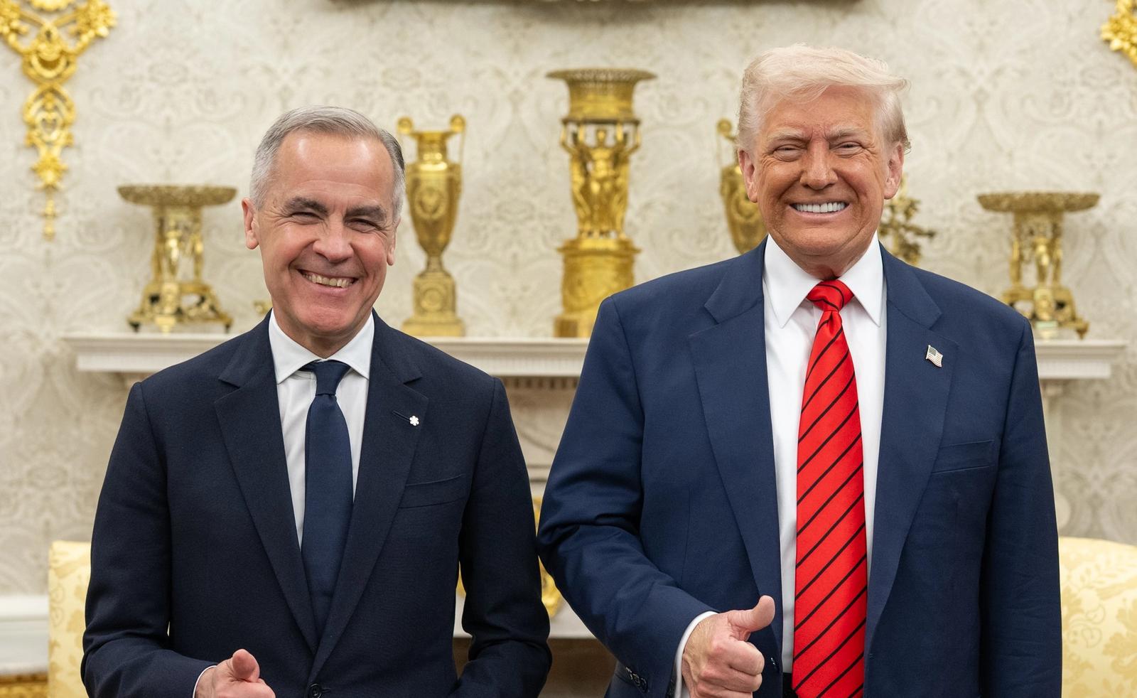 Mark Carney and Donald Trump posing for a photo in the White House Oval Office