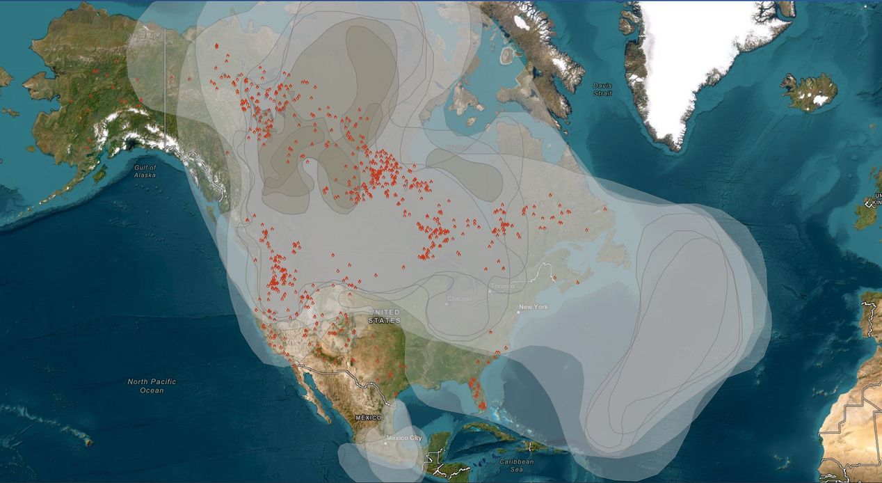 A smoke map of North America showing the density of smoke from coast to coast, along with the location of fires