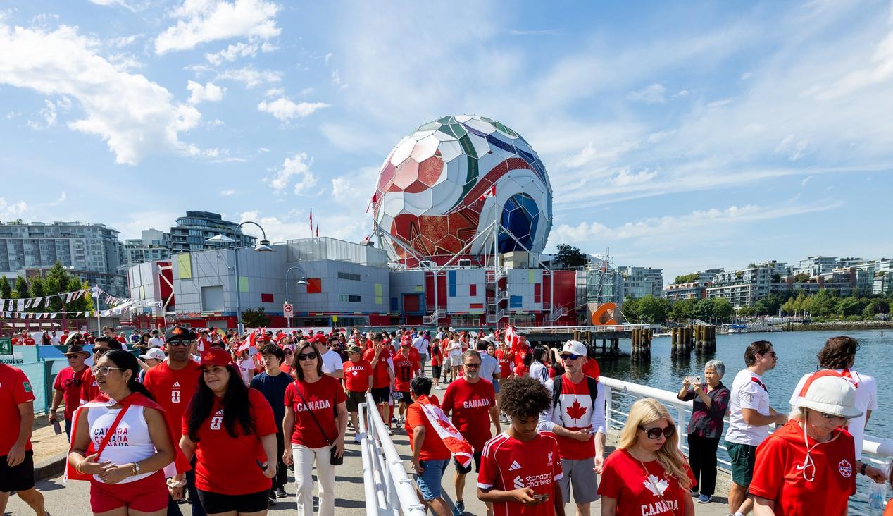 Canadian fans marching to BC Place prior to Canada's match against Switzerland