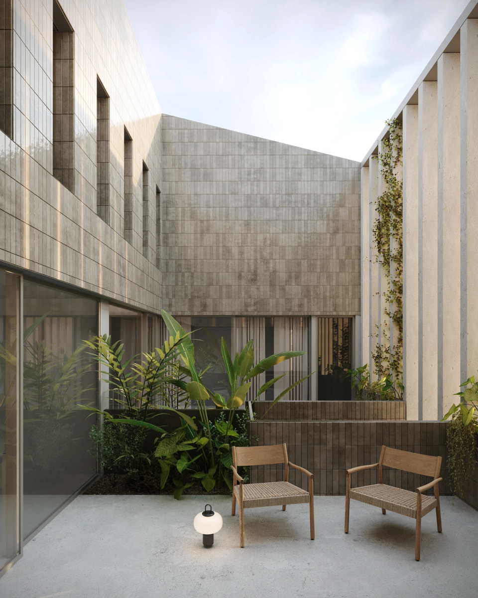 Houses in Bescanó with a landscaped interior courtyard that provides natural light, ventilation, and protected resting spaces. These houses in Bescanó combine mineral materials, vegetation, and large glazed surfaces to create contemporary, peaceful architecture connected to the outdoors.
