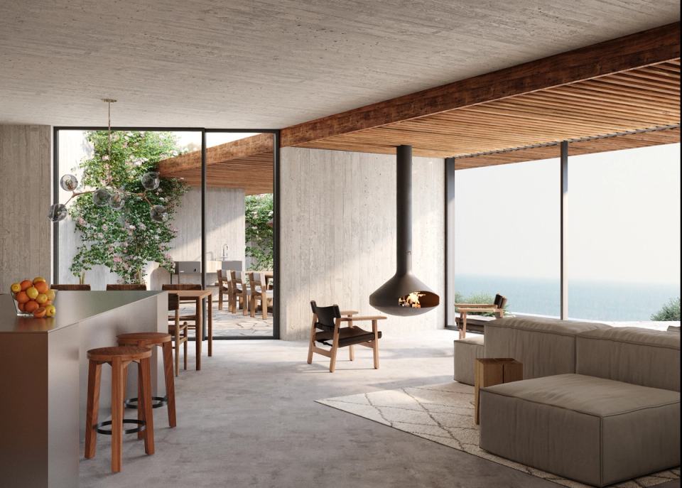 Interior of the detached house designed with open spaces, natural materials, and large windows that frame the landscape and maximize natural light. The combination of concrete, wood, and warm textures creates a contemporary, serene atmosphere connected to the Mediterranean outdoors.