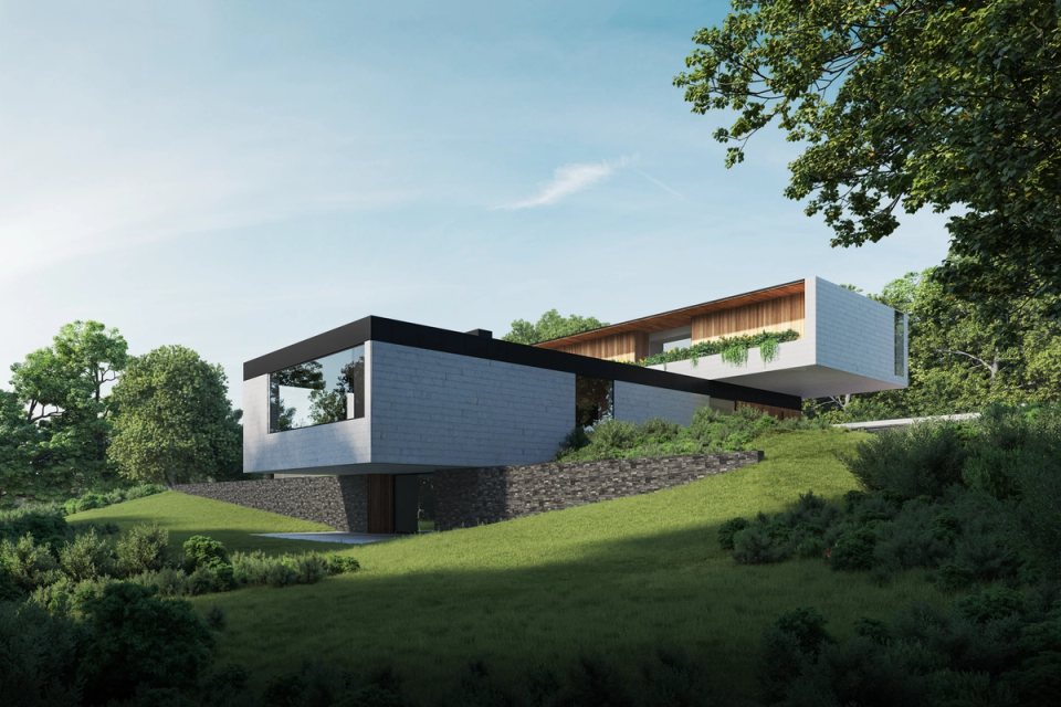 This detached single-family home stands out for its contemporary architecture with pure lines and cantilevered volumes that integrate elegantly into the natural landscape. The project takes advantage of the site’s slope to create a harmonious and functional layout, combining large glazed surfaces, noble materials, and open spaces that enhance natural light, views, and the connection with the surroundings.