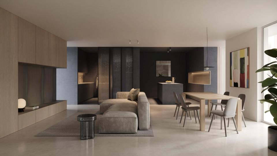 Interior renovation with an open day area that integrates the living room, dining room, and kitchen into an elegant and functional environment. This interior renovation combines natural wood, dark tones, and large openings to create a contemporary, warm, and sophisticated atmosphere.